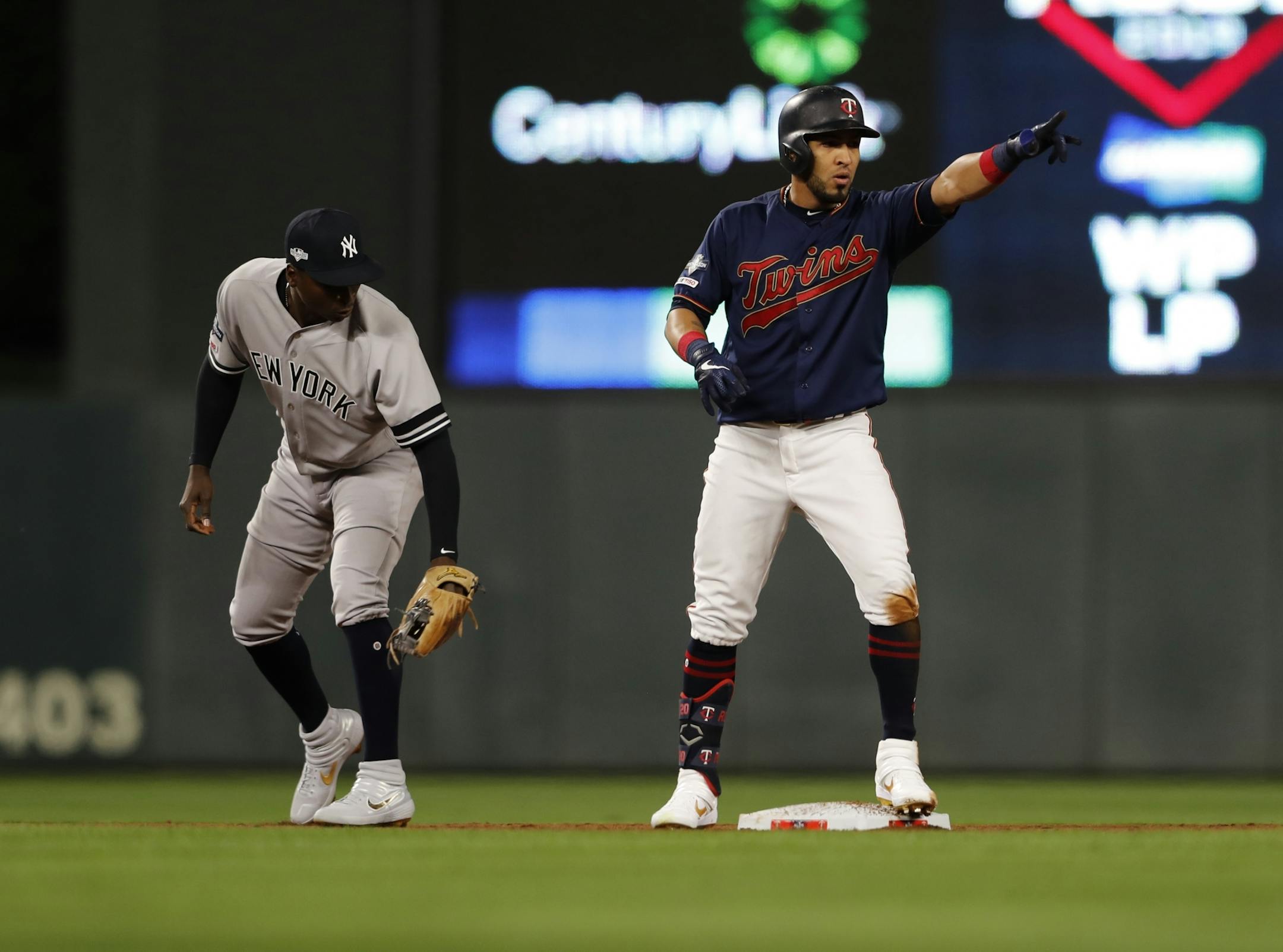 Minnesota Twins right fielder Eddie Rosario (20) celebrated hitting a double in the third inning.