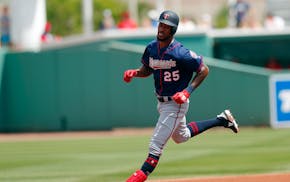 Twins center fielder Byron Buxton rounds the bases after hitting a solo-home run in the third inning of a spring training game against the Red Sox on 