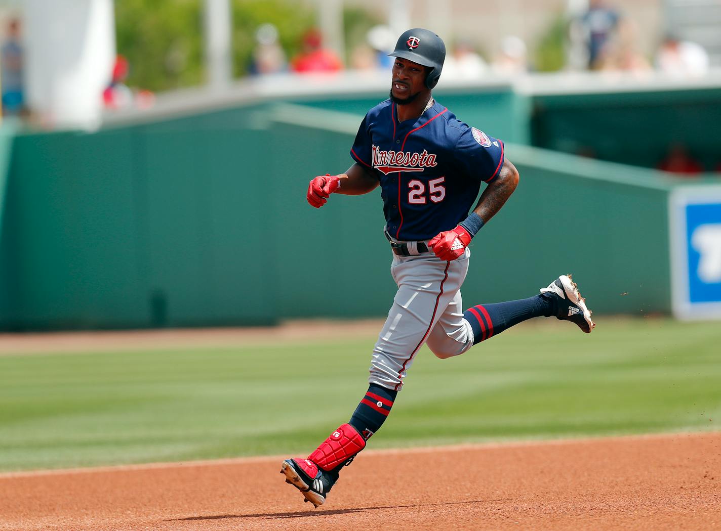 Twins center fielder Byron Buxton rounds the bases after hitting a solo-home run in the third inning of a spring training game against the Red Sox on Wednesday