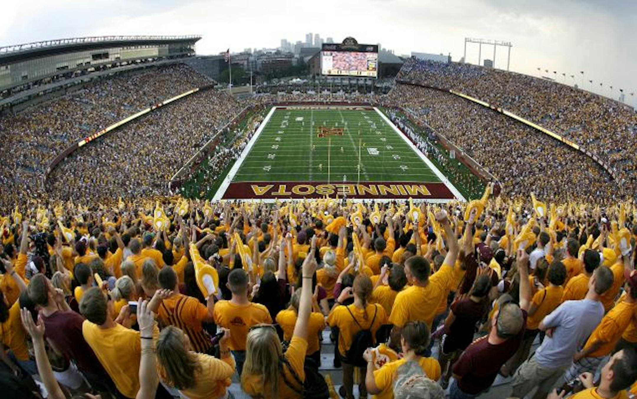 Gopher football fans cheered as Air Force kicked the ball off on the first play of the outdoor era at the U of M at the new TCF Bank Stadium.