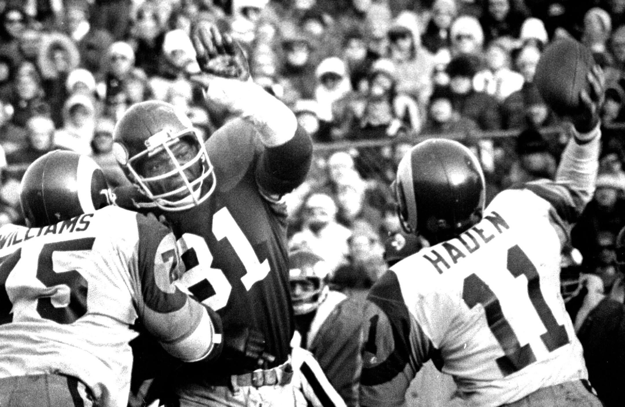 Vikings great Carl Eller reached out to bat down a pass during the conference championship game against the Los Angeles Rams in December 1976.