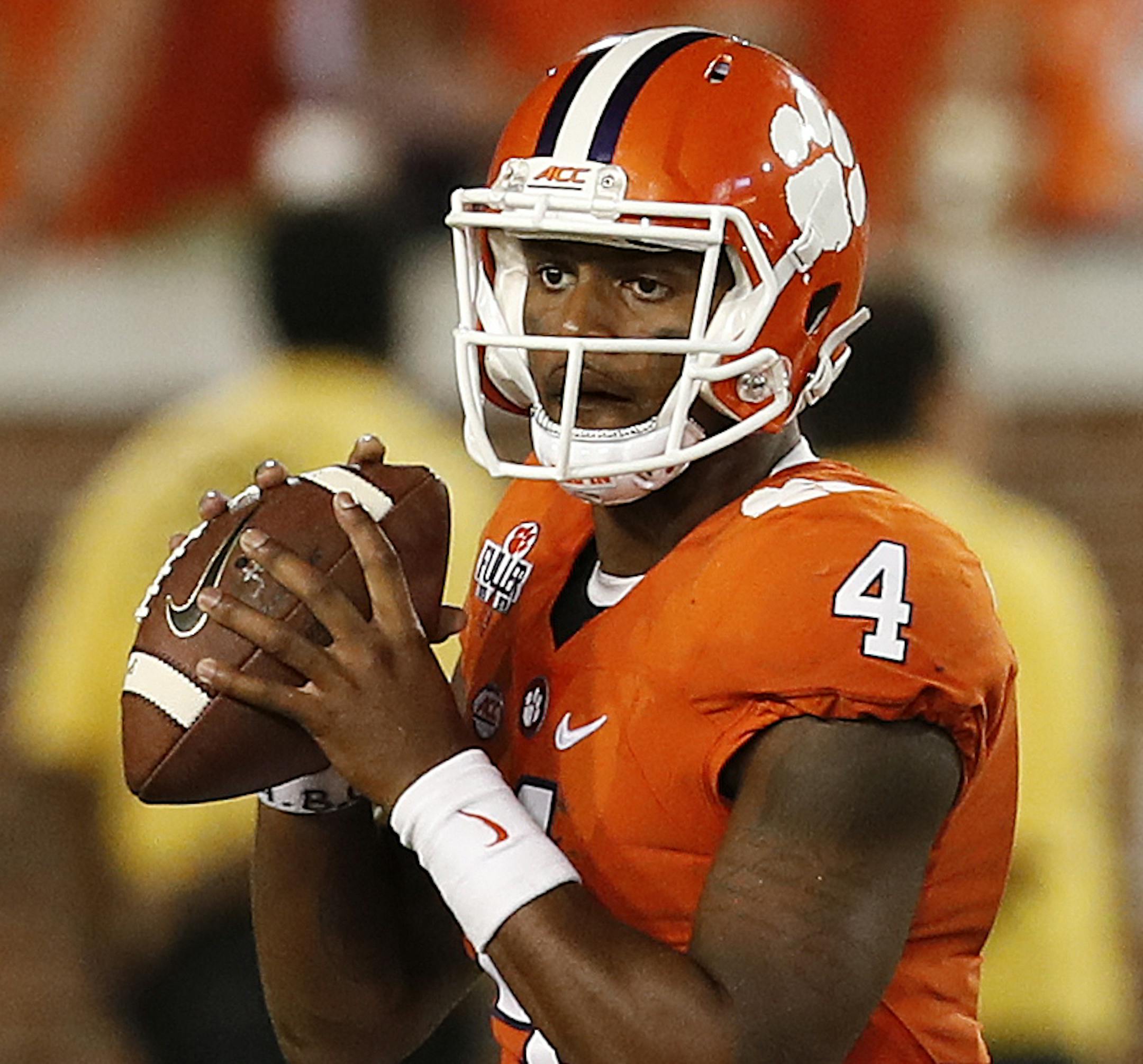 Clemson quarterback Deshaun Watson (4) throws against Georgia Tech in the first half of an NCAA college football game Thursday, Sept. 22, 2016, in Atlanta. (AP Photo/John Bazemore) ORG XMIT: GAJB10