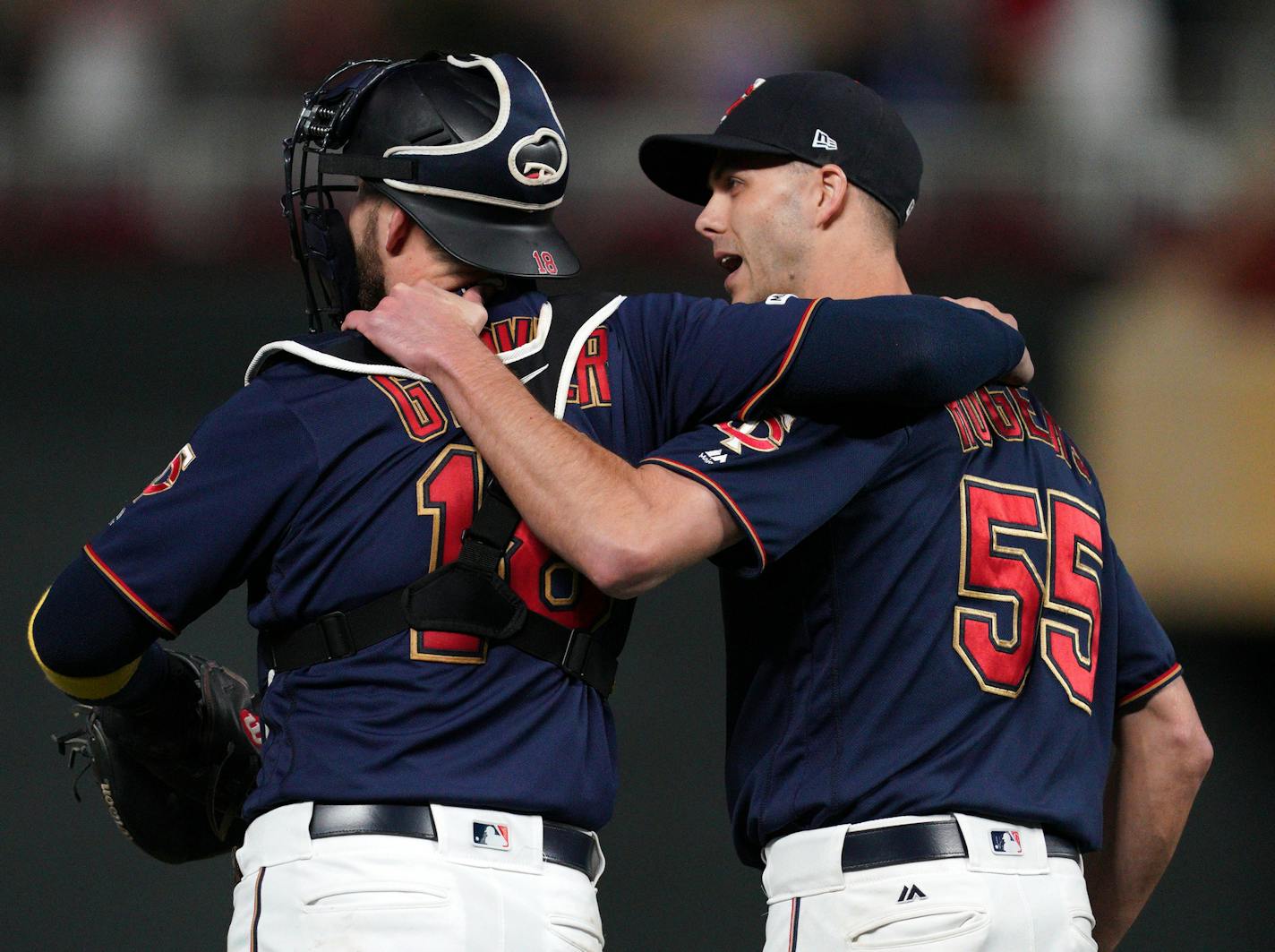 Minnesota Twins catcher Mitch Garver (18) and Minnesota Twins relief pitcher Taylor Rogers (55) celebrated the win over Cleveland. ] ANTHONY SOUFFLE • anthony.souffle@startribune.com The Minnesota Twins played the Cleveland Indians in the second game of their series Saturday, Sept. 7, 2019 at Target Field in Minneapolis. ORG XMIT: MIN1909072140377434