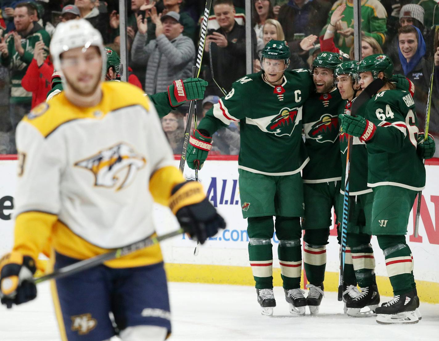 Minnesota Wild right wing Mikael Granlund (64) celebrated with his teammates after he scored past Nashville Predators goaltender Pekka Rinne (35) for his second goal of the game in the first period. ] ANTHONY SOUFFLE &#xef; anthony.souffle@startribune.com The Minnesota Wild played the Nashville Predators in an NHL game Friday, Dec. 29, 2017 at the Xcel Energy Center in St. Paul, Minn.