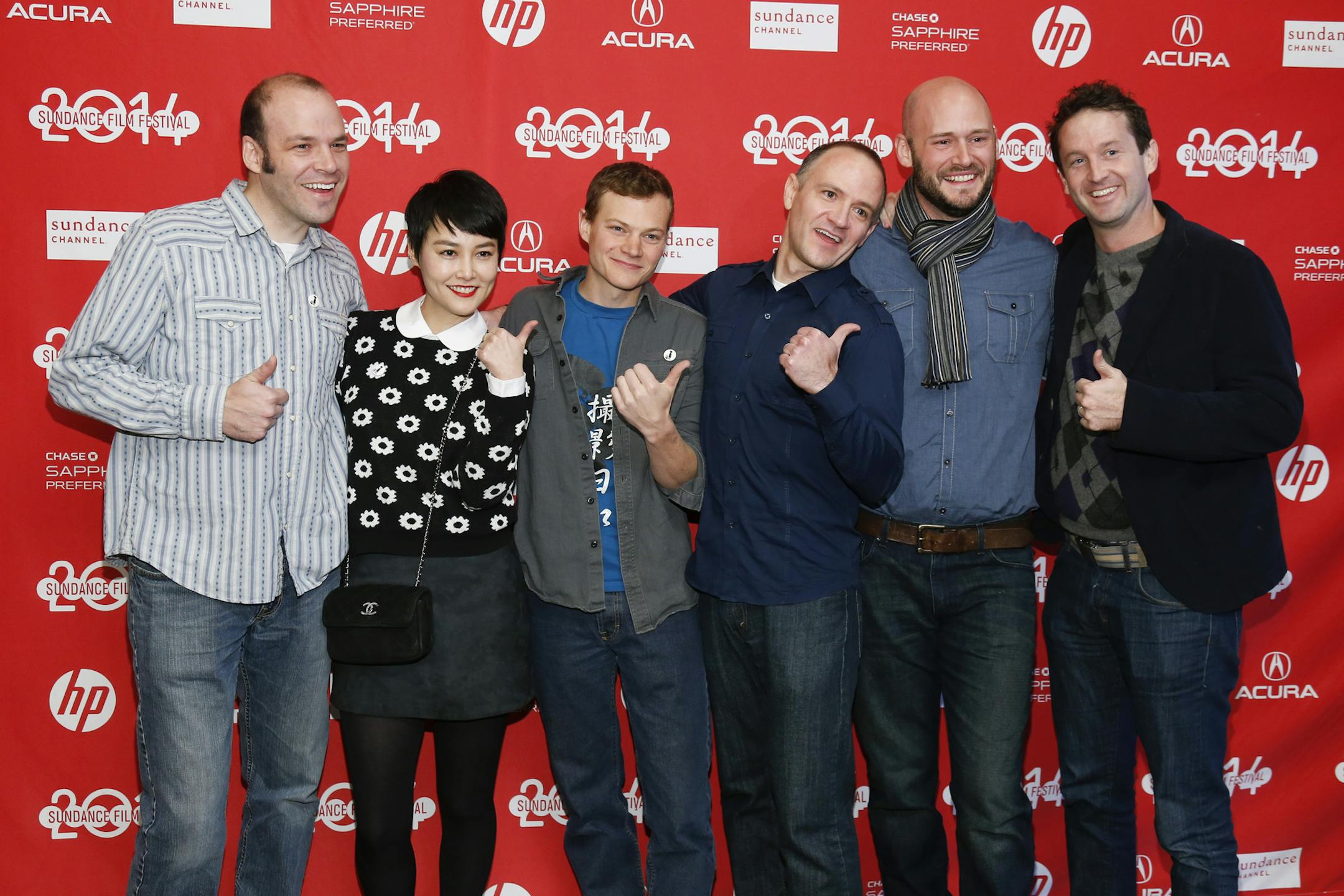 From left, writer and producer Nathan Zellner, cast member Rinko Kikuchi, director of photography Sean Porter, director David Zellner, producer Chris Ohlson and Director of Programming for the Sundance Film Festival Trevor Groth pose together at the premiere of the film "Kumiko, the Treasure Hunter," during the 2014 Sundance Film Festival, on Monday, Jan. 20, 2014, in Park City, Utah. (Photo by Danny Moloshok/Invision/AP)