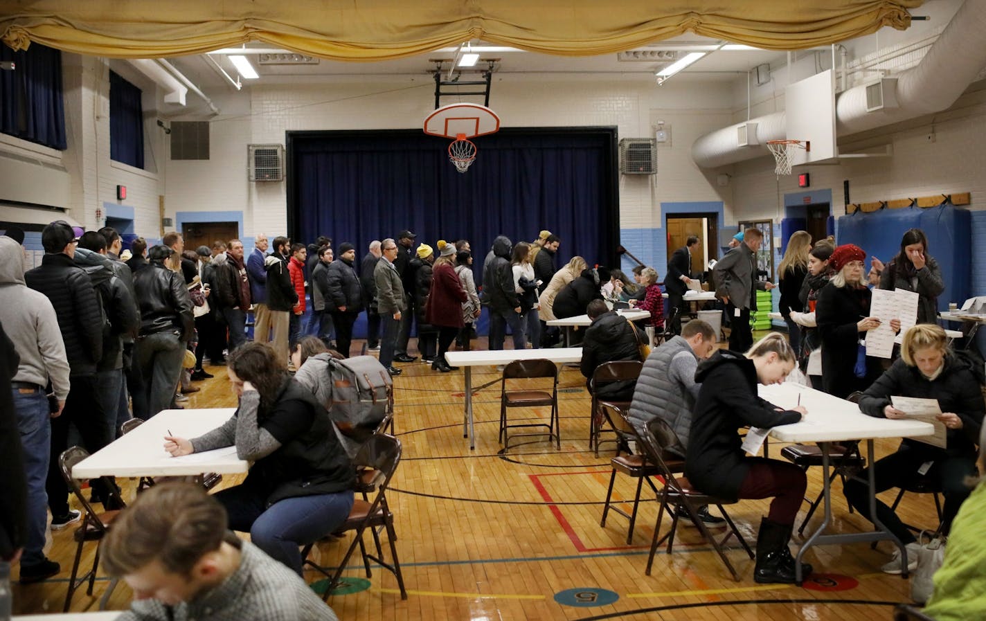 Voters pack the gymnasium Tuesday, Nov. 6, 2018, at Emerson Spanish Immersion School in Minneapolis, MN.