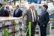 In 2021, Gov. Tim Walz toured a factory that makes components for electric vehicles as part of an event announcing Minnesota’s new clean car rules. 