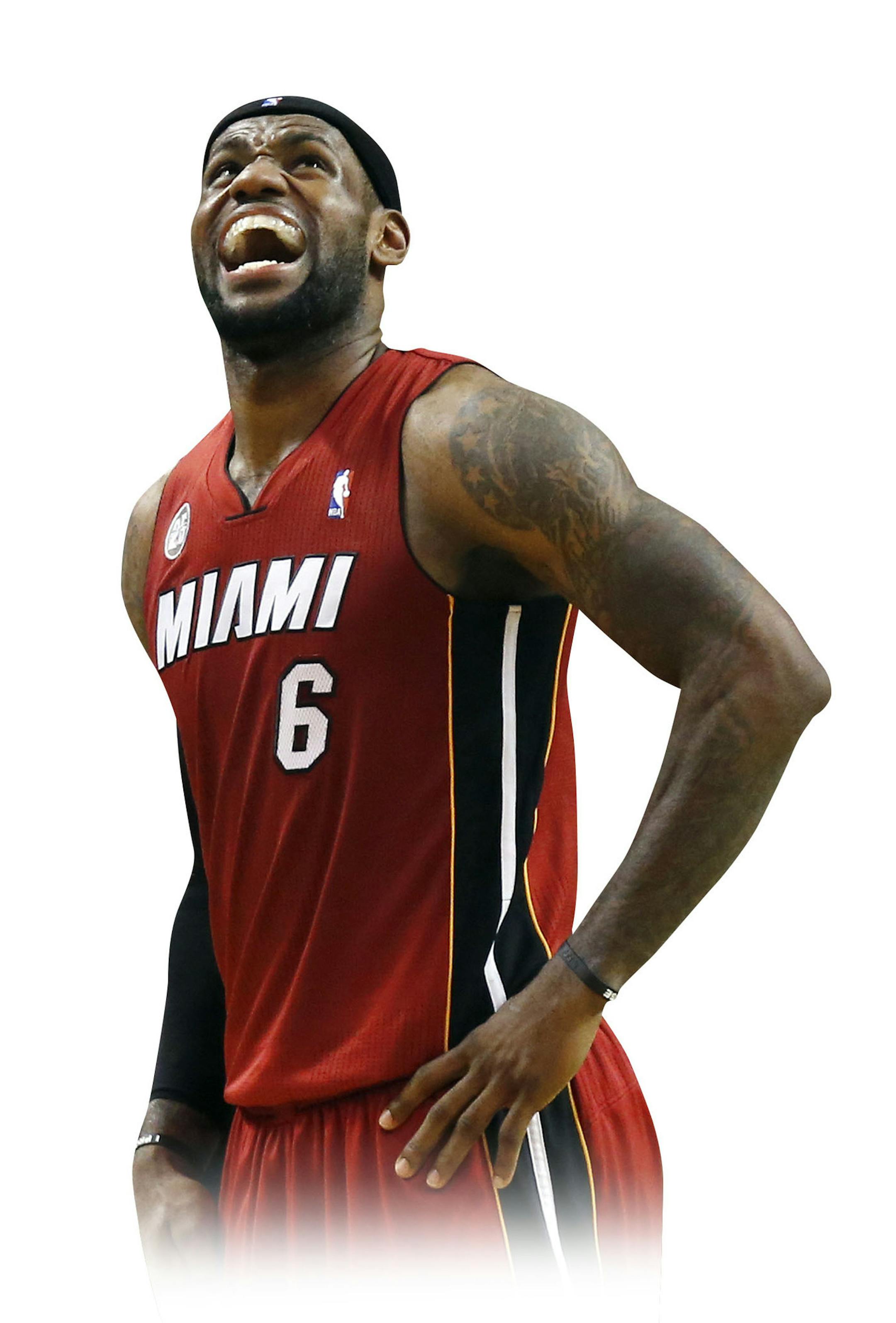 Miami Heat's LeBron James (6) reacts while looking at the scoreboard in the third quarter of an NBA basketball game against the Boston Celtics in Boston, Monday, March 18, 2013. (AP Photo/Michael Dwyer) ORG XMIT: MAMD101