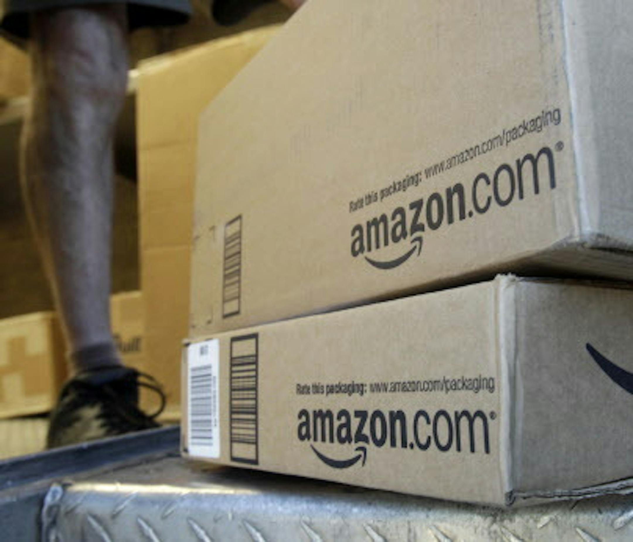 A United Parcel Service driver delivers packages from Amazon.com in Palo Alto, Calif., Thursday, June 30, 0211. Amazon.com Inc. said Wednesday that it will stop working with online affiliates based in California since the state passed a new rule that forces online retailers to collect sales tax there. In an email Wednesday to California-based affiliates &#x201a;&#xc4;&#xee; individuals or companies who run websites that refer visitors to Amazon and then get a cut of any resulting sales &#x201a;&