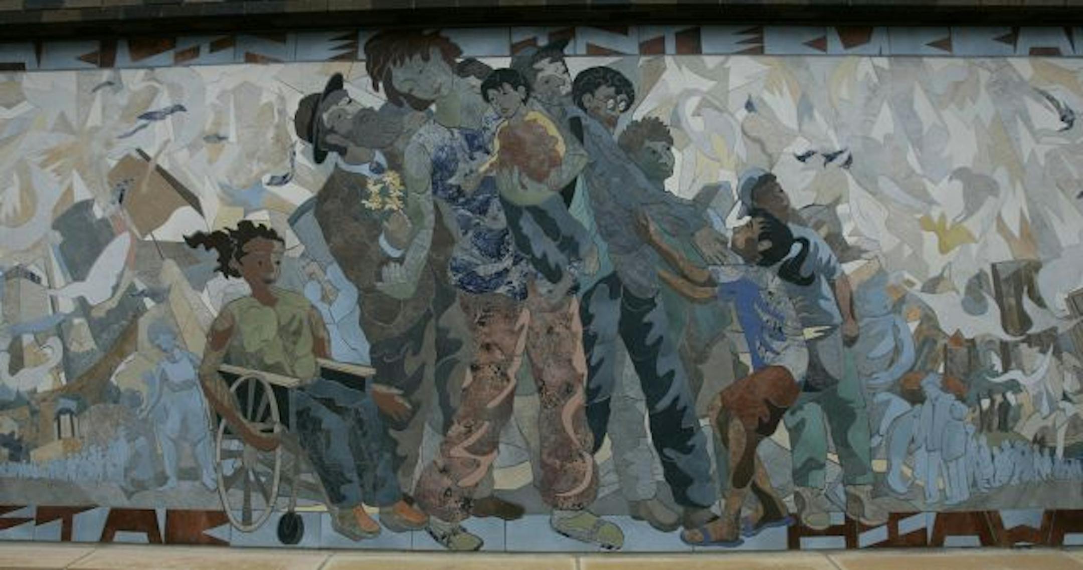 Mosaic murals by St. Paul artist Craig David, installed along the ballpark's exterior on 5th Street, are among the features that officials hope will eventually contribute to the development of a new downtown district.