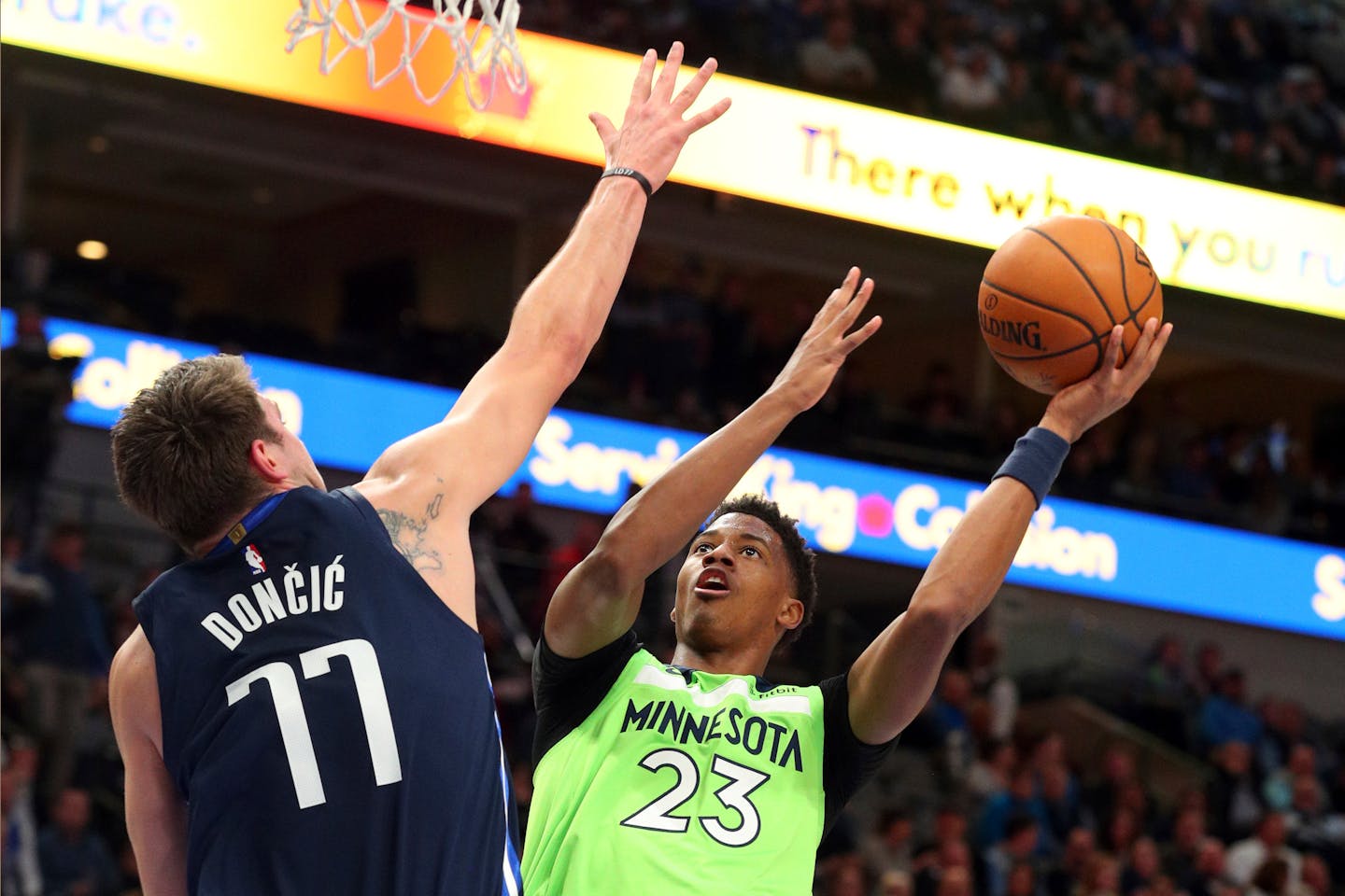 Dallas forward Luka Doncic tries to defend against a shot by Timberwolves guard Jarrett Culver on Wednesday.