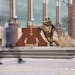 Students pass a statue of Goldy the gopher and the university’s logo during a class change Thursday, Jan. 18, 2024, at the University of Minnesota i