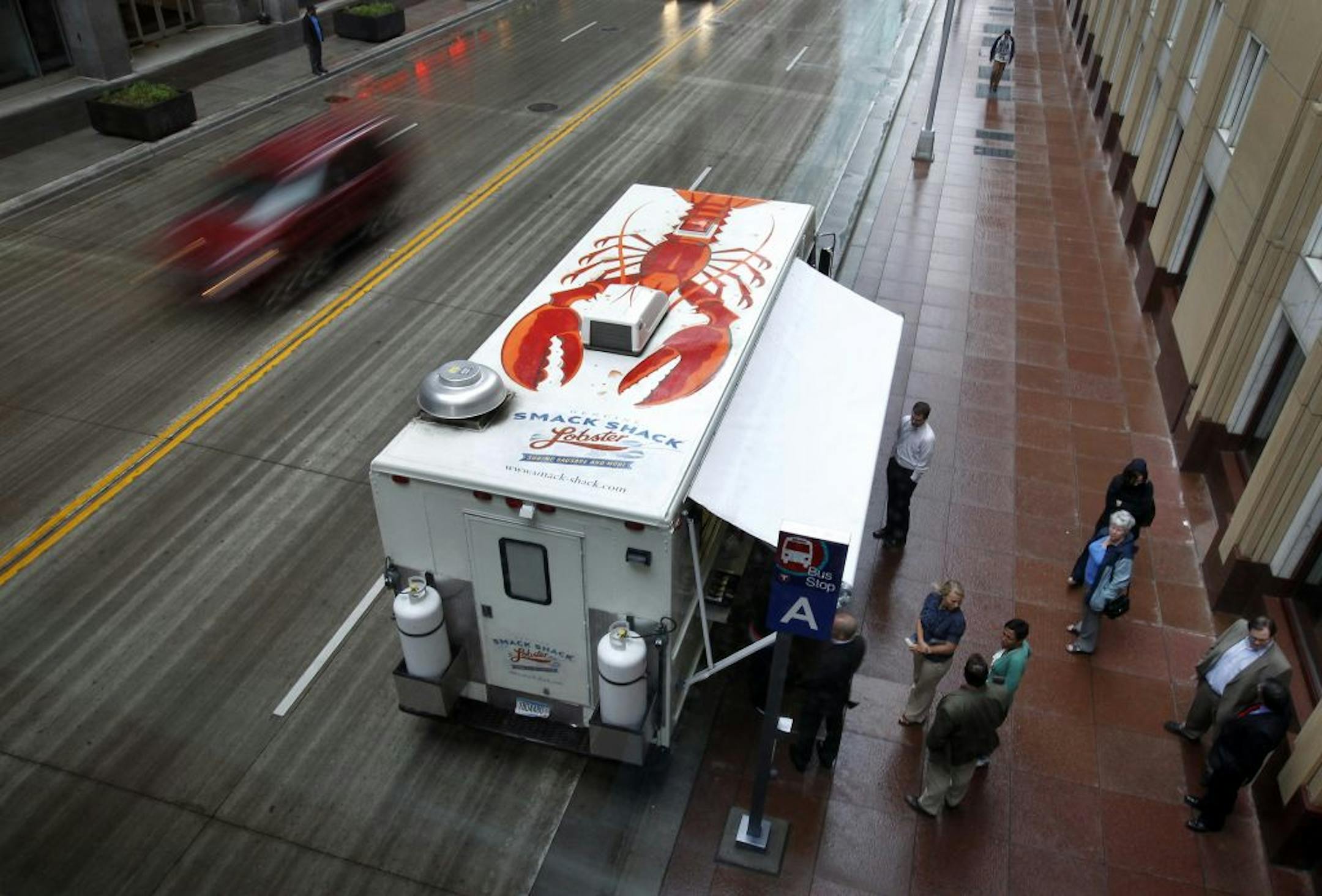 Patrons at the Smack Shack food truck parked in downtown Minneapolis.