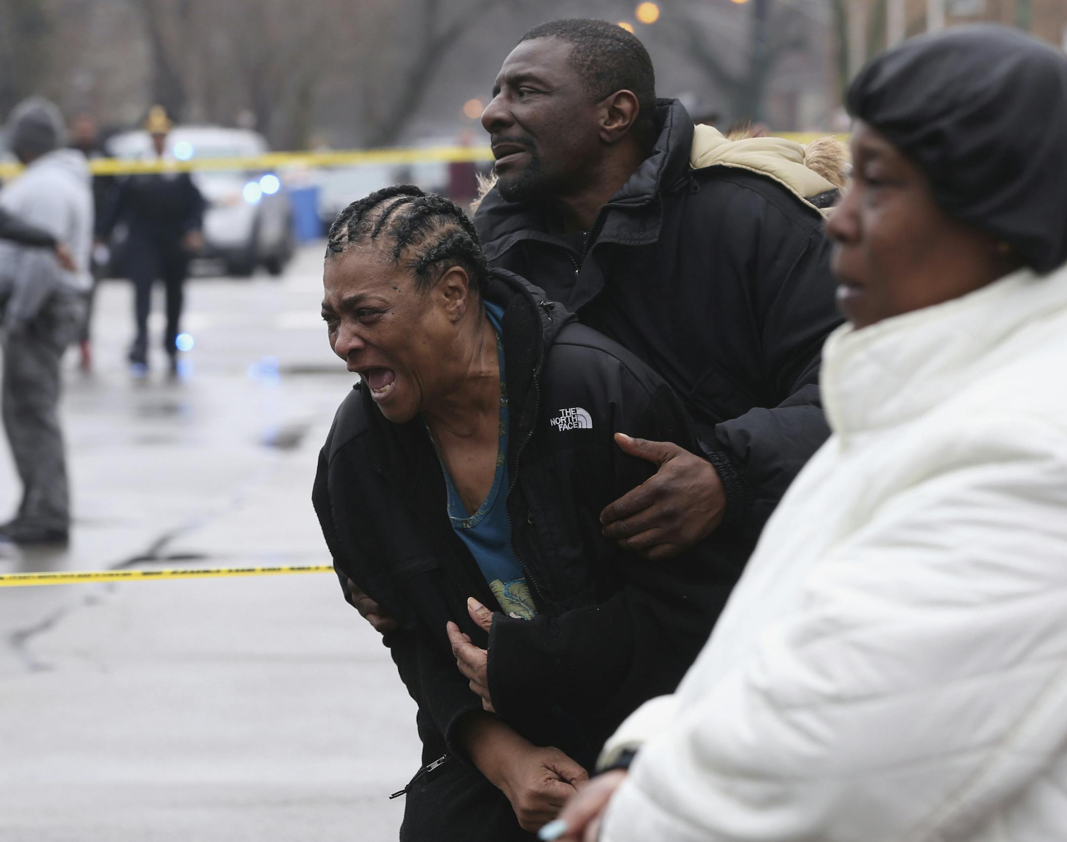 FILE - In this March 30, 2017, file photo, Georgia Jackson, 72, is overcome with emotion after learning that her two grandsons were found fatally shot in Chicago's South Shore neighborhood. Chicago police, federal agents and prosecutors plan to announce Friday, June 30 they are launching a new initiative to stem the flow of illegal firearms in the city as part of efforts to curb rampant gun violence that President Donald Trump says is at "epidemic proportions." (Chris Sweda /Chicago Tribune via