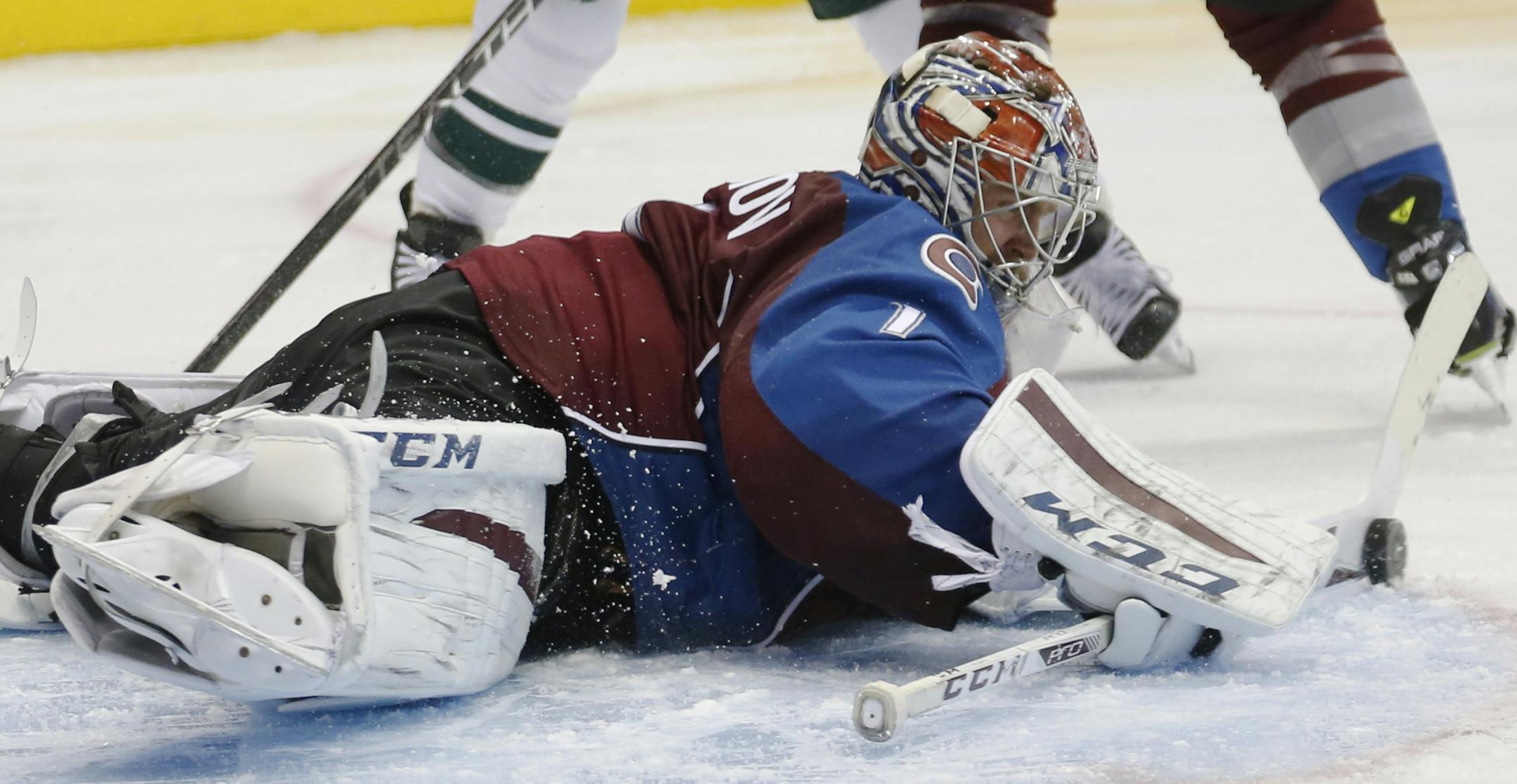 Colorado Avalanche goalie Semyon Varlamov, of Russia, makes a stick save during the second period of an NHL hockey game against the Minnesota Wild, Monday, Dec. 7, 2015, in Denver.