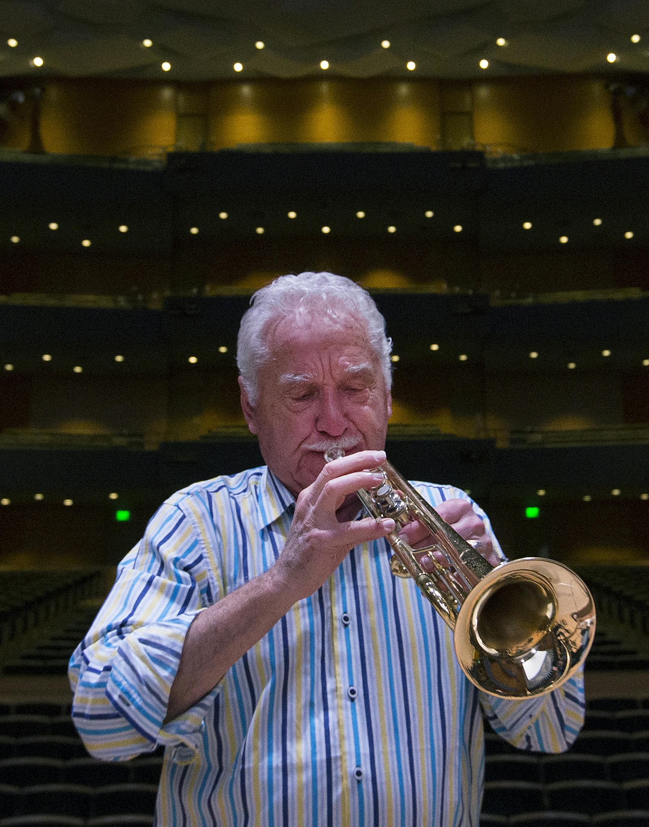 Doc Severinsen, 88, warmed up on his trumpet in an empty Orchestra Hall in Minneapolis, MN. Severinsen is in town to perform Jingle Bell Doc with the Minnesota Orchestra. He is best known for leading the NBC Orchestra on The Tonight Show Staring Johnny Carson. ] CARLOS GONZALEZ &#xef; cgonzalez@startribune.com - December 15, 2015 - 88-year-old Doc Severinsen, who is still playing the trumpet of his own design, still rocking those spangled suits. The beloved musician is performing his annual Chri