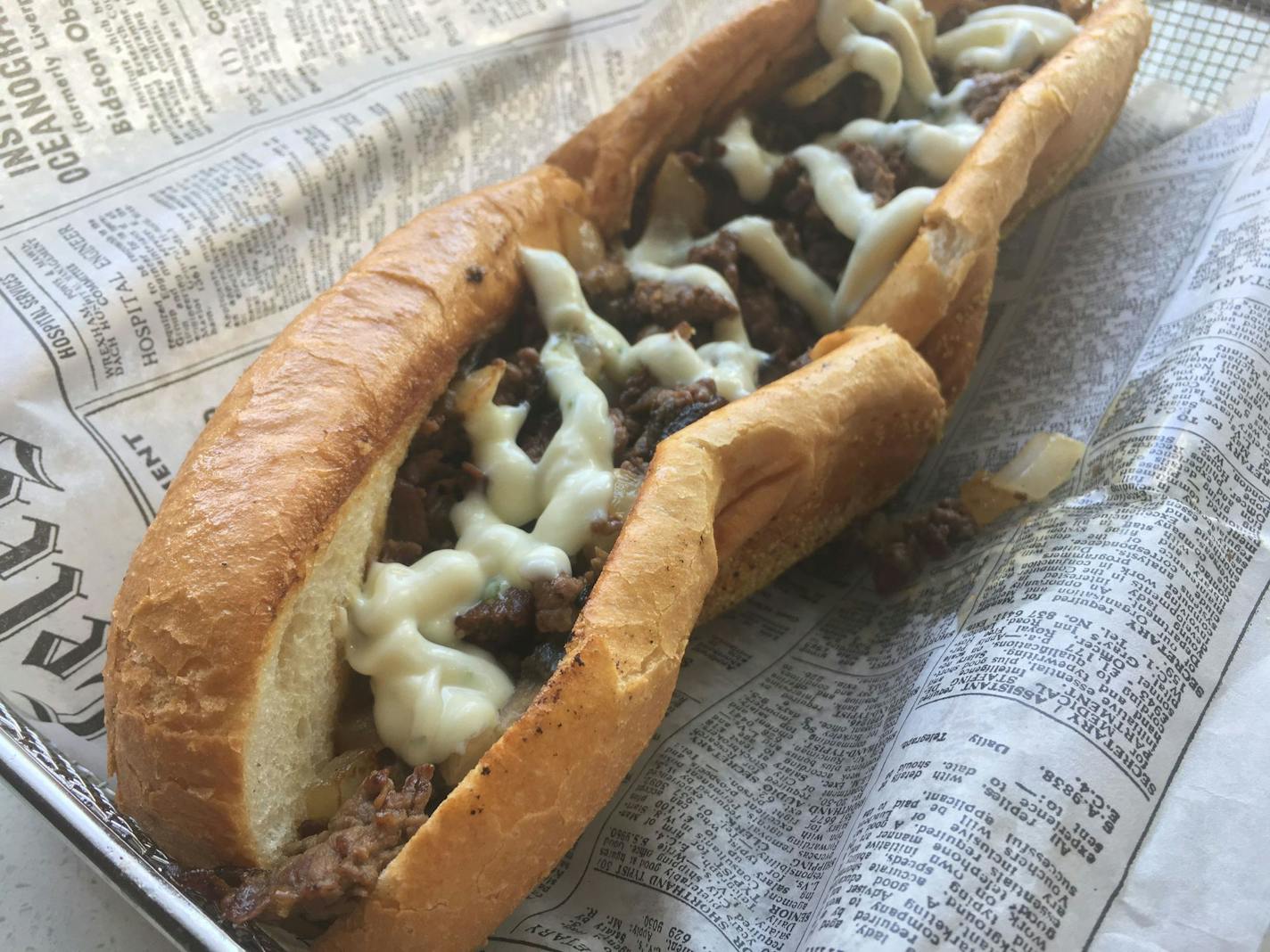 The No. 8 Mushroom American cheesesteak at Tono Pizzeria & Cheesesteaks has grilled onion, mushroom, white American cheese, red chili oil and garlic aioli.