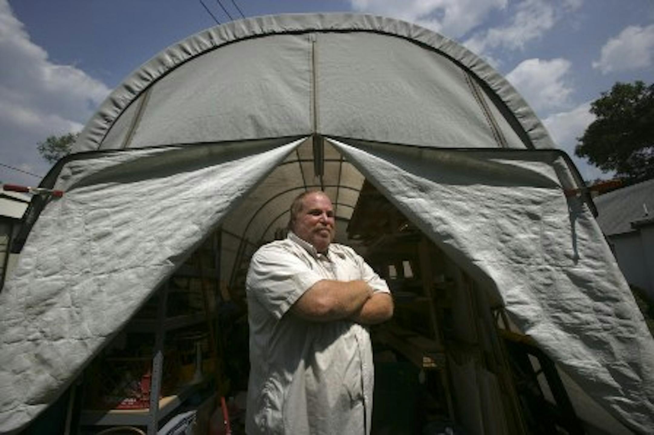 Mark Kreutter and his shed (Star Tribune photo by Joel Koyama)