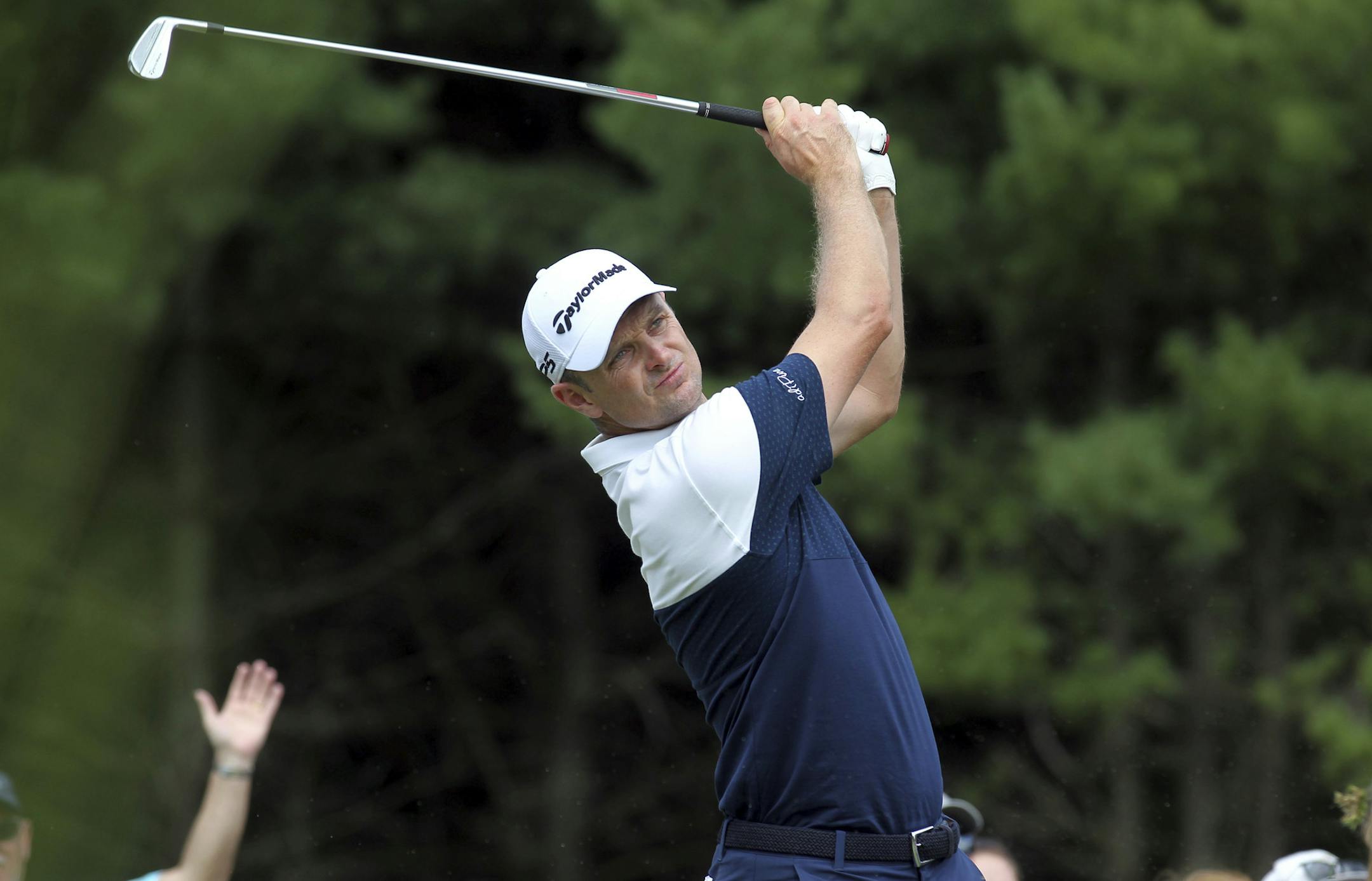 Justin Rose, of England, hits off the third tee during the first round of the Dell Technologies Championship golf tournament at TPC Boston in Norton, Mass., Friday, Aug. 31, 2018. (AP Photo/Stew Milne)