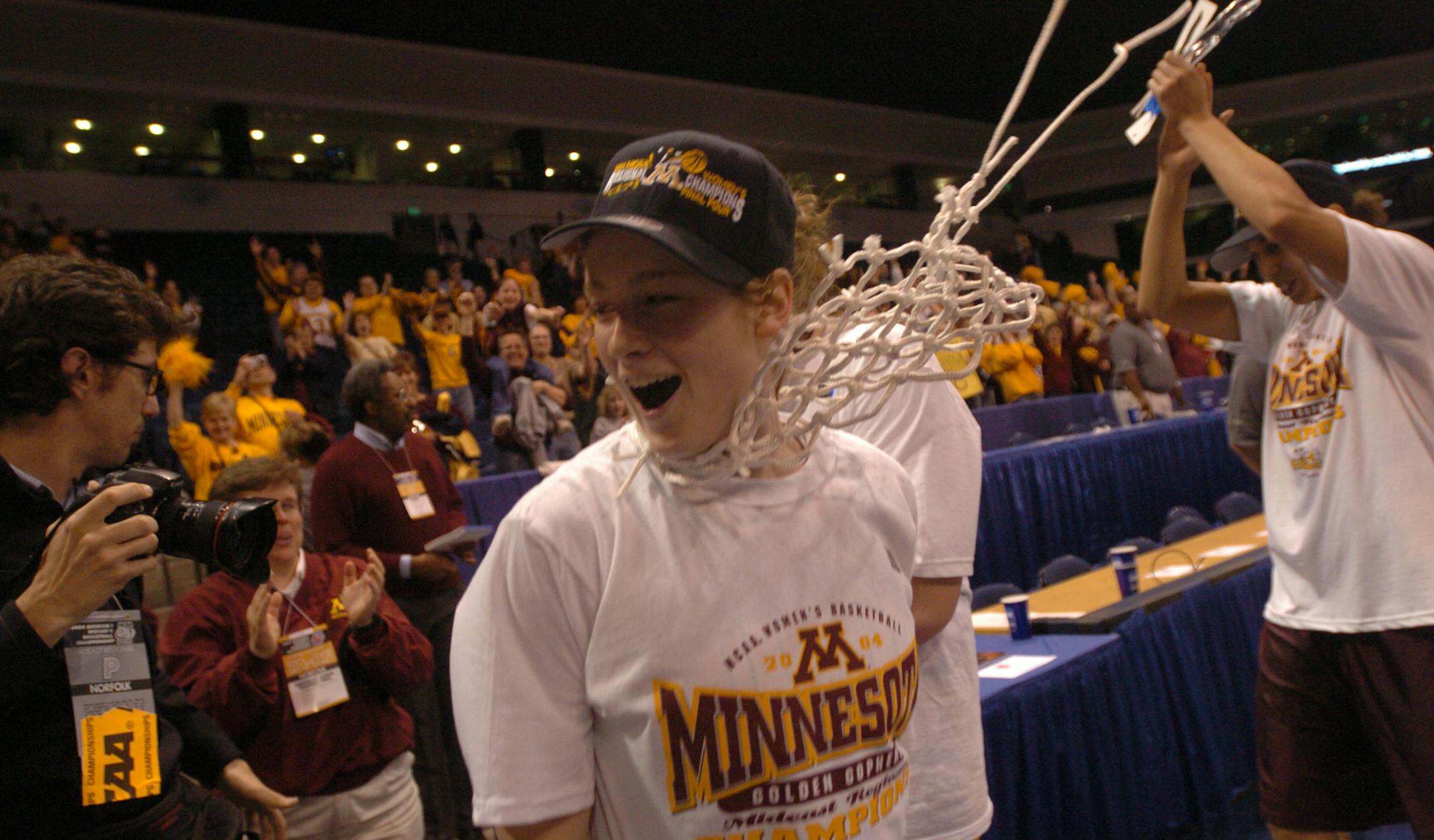 KYNDELL HARKNESS/Star Tribune -- Lindsay Whalen cheers along with her teammates and fans after their win against Duke. ORG XMIT: MIN2014041519321177
