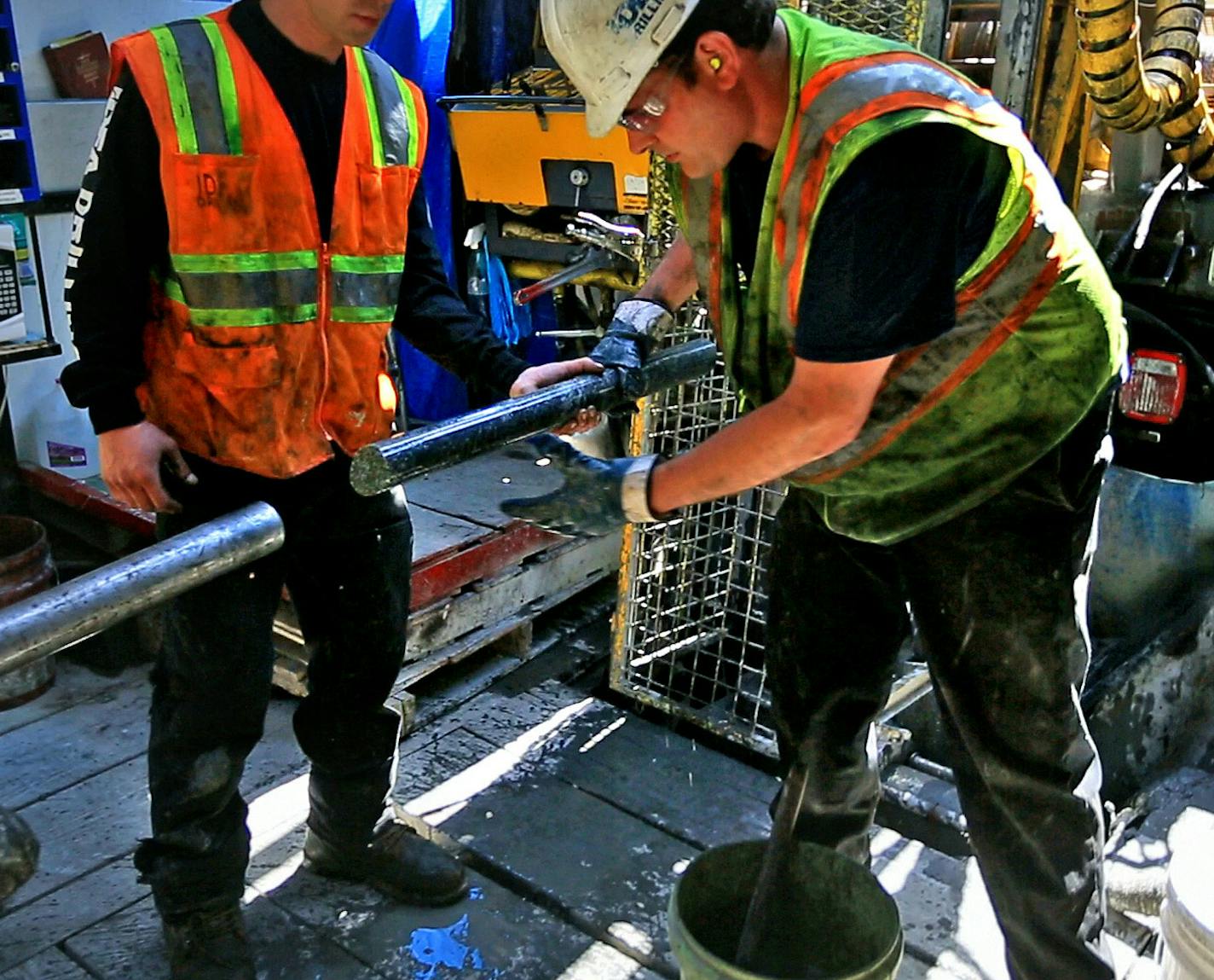 Not since the battle of 1978 to designate the BWCA as a wilderness area has the town of Ely been so divided. This time it's the possibility of Copper/Nickel mining and the promised jobs it brings -vs- the fear that mining so close to the BWCA could contaminate the water. Here, drillers for Twin Metals, at a site near the Kiwishiwi River, pull a core sample from the drill pipe. ] BRIAN PETERSON &#x2022; brianp@startribune.com ELY, MN - 05/30/2013 ORG XMIT: MIN1305310946521019