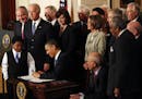 President Barack Obama signed into law the Affordable Health Care for America Act during a ceremony at the White House in 2010.