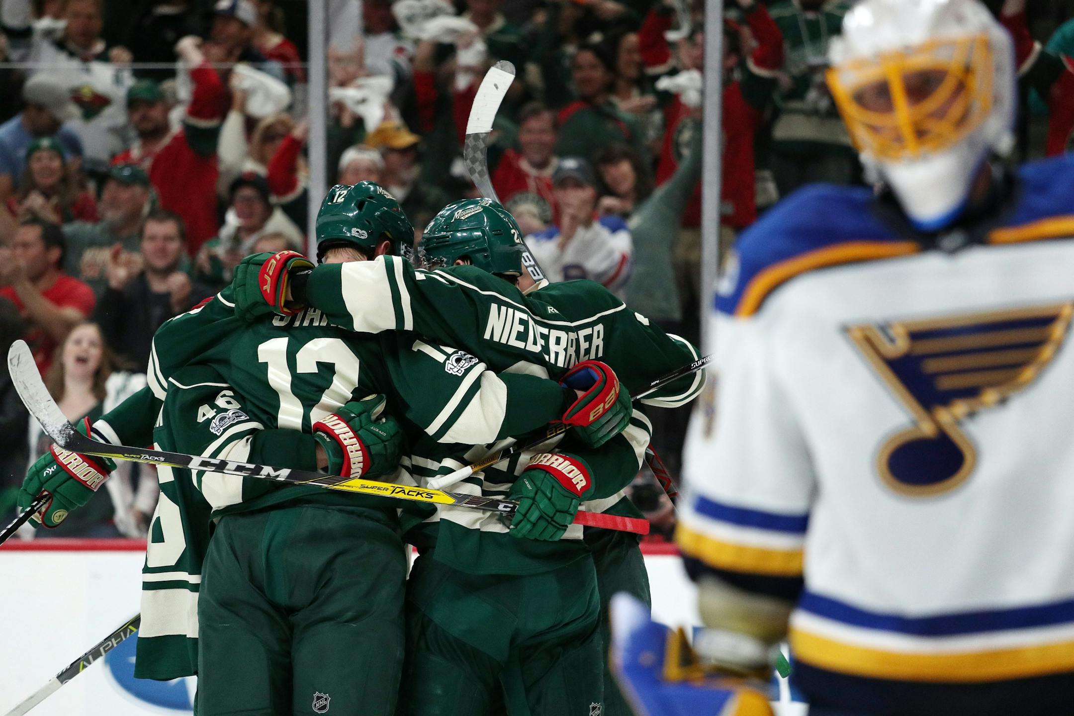 The Minnesota Wild celebrate their first goal of the game in the first period.