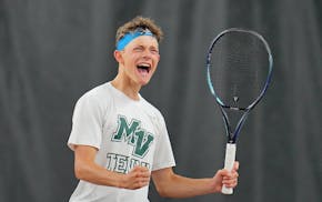 Soren Swenson of Mounds View cheers while playing against Aaron Beduhn of Wayzata during the Class 2A boys tennis individual singles championship matc