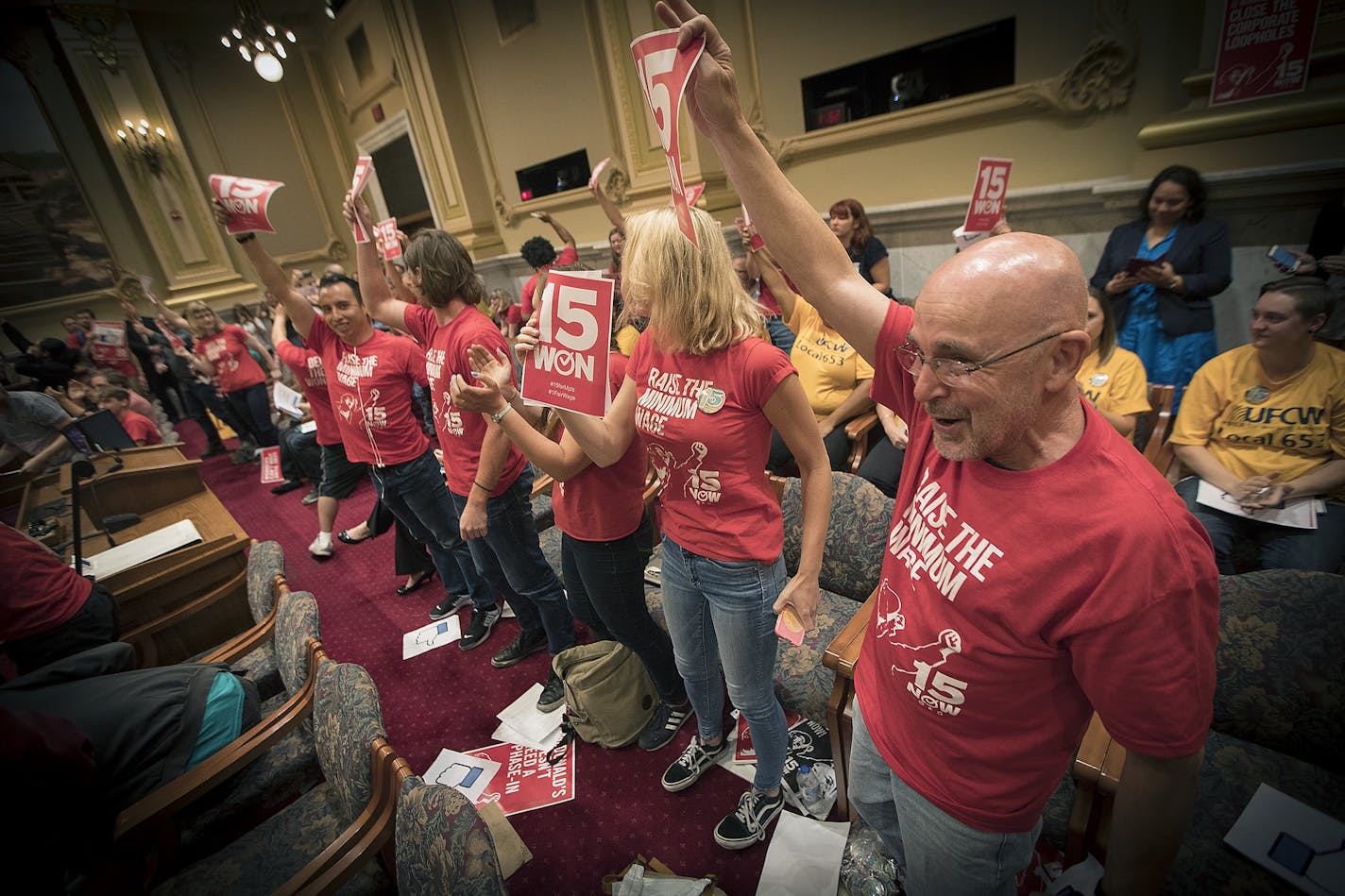 Supporters of the $15 minimum wage increase celebrated after it was passed by the Minneapolis City Council Friday.