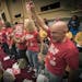 Supporters of the $15 minimum wage increase celebrated after it was passed by the Minneapolis City Council Friday.