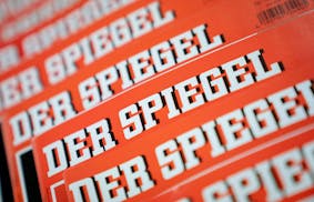 The Dec. 19, 2018 photo shows issues of German news magazine Spiegel arranged on a table in Berlin. An award-winning journalist who worked for Der Spi