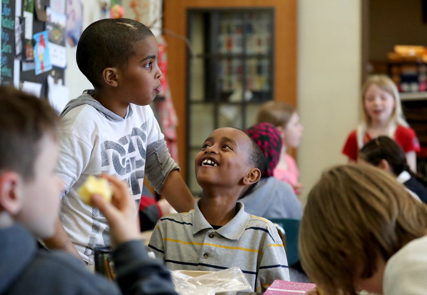 Barton Open School students in a combination third- and fourth-grade class taught by Jaci Sullivan socialized while eating lunch in their classroom this spring.