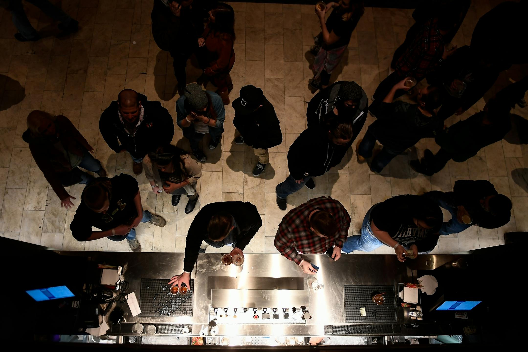 Concertgoers bought drinks at Saturday night's grand opening show at the Palace Theatre.