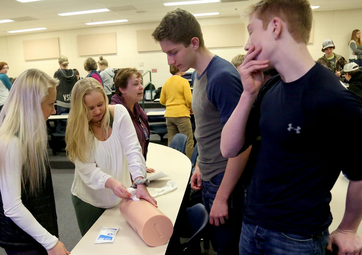 Fairview Health Services employees visited Hastings High School as part of a program to train staff and students on handling trauma situations.