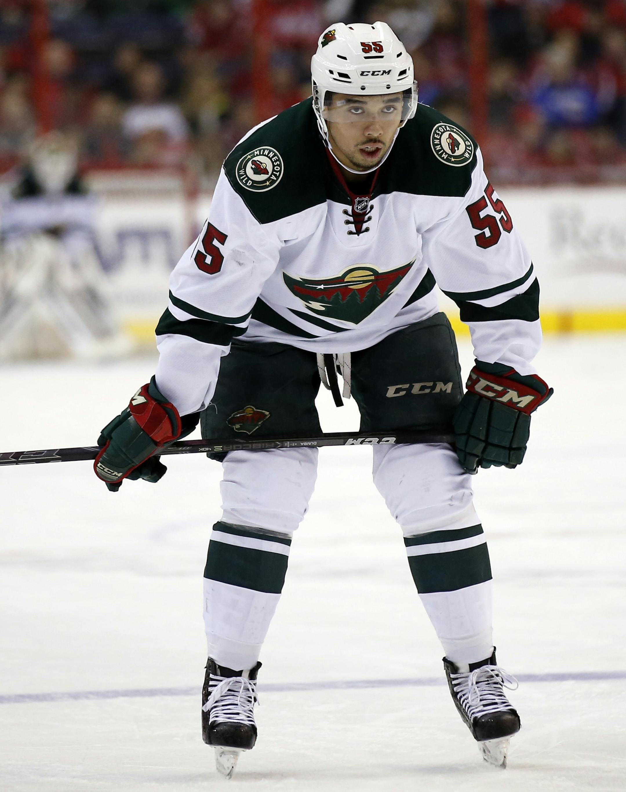 Minnesota Wild defenseman Matt Dumba (55) pauses in the second period of an NHL hockey game against the Washington Capitals, Thursday, March 5, 2015, in Washington. (AP Photo/Alex Brandon) ORG XMIT: VZN10 ORG XMIT: MIN1503161901484595