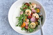A snappy shrimp salad sits atop a swipe of creamy feta for a springtime salad. Shrimp and Arugula Salad with Mint Vinaigrette and Whipped Feta. Credit
