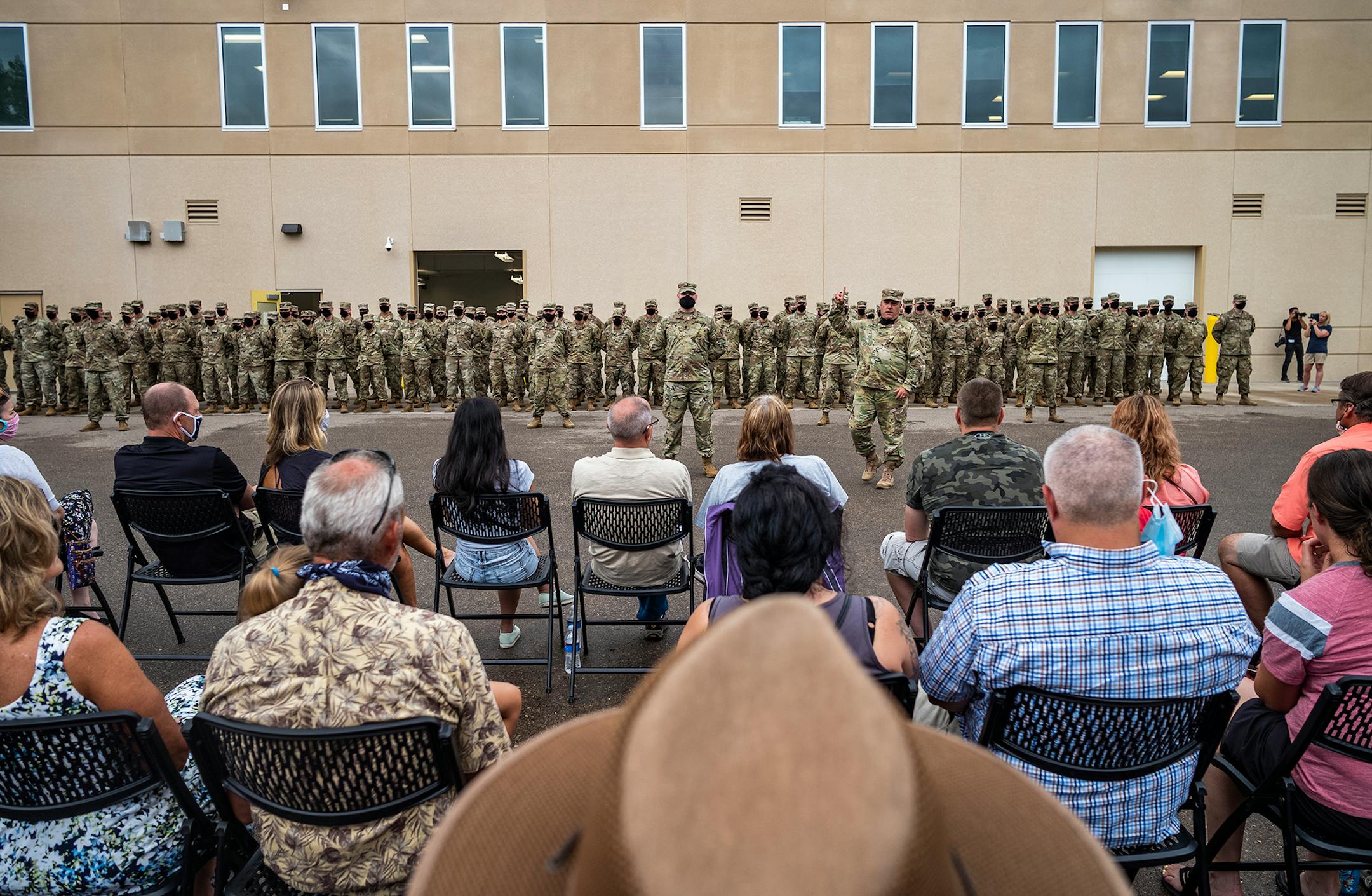Colonel Brian Pfarr, far right, addressed the approximately 150 soldiers from the Stillwater-based 34th Military Police Company who will deploy to Naval Station Guantanamo Bay in support of Joint Task Force Guantanamo to provide base security.