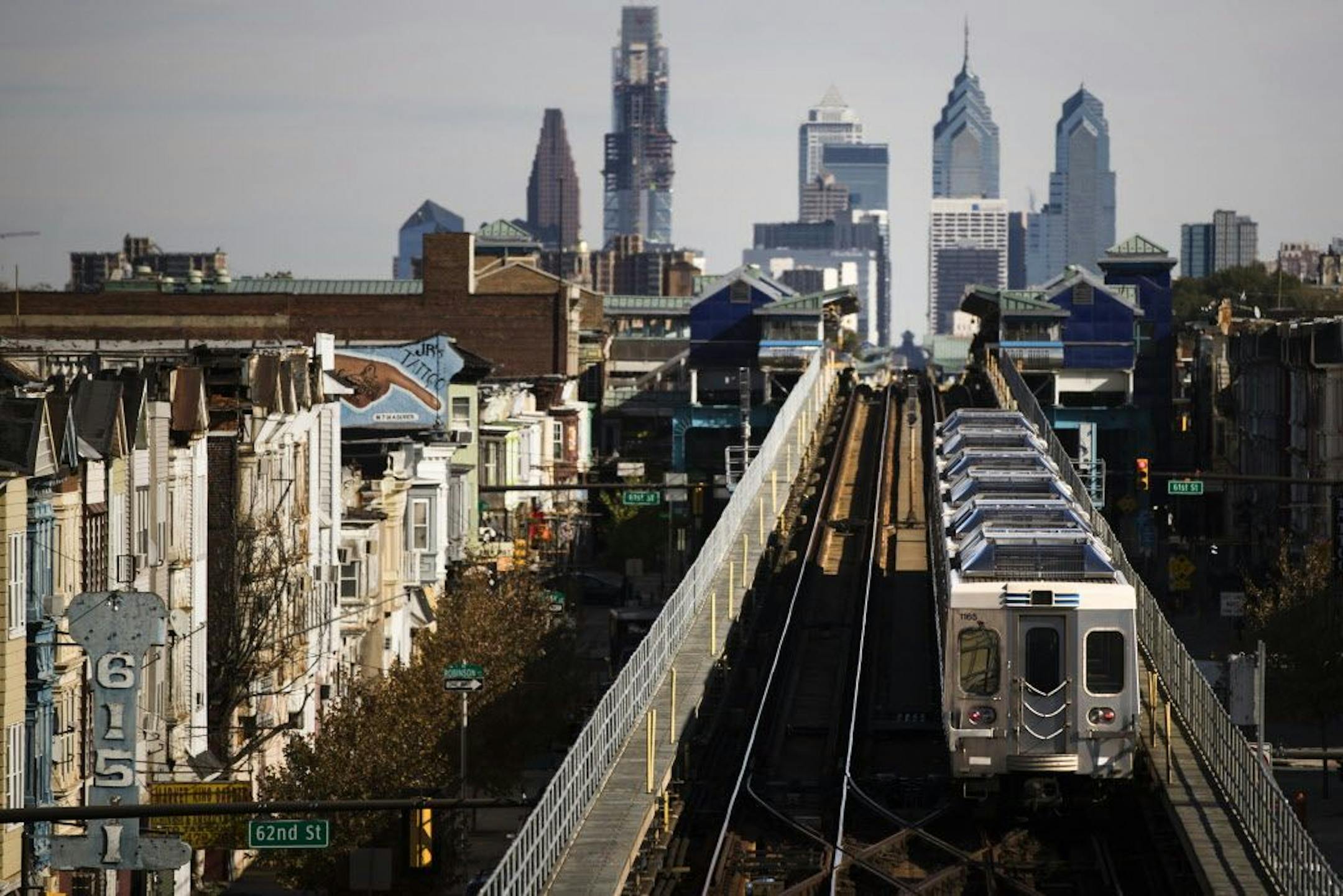 In this Wednesday, Oct. 26, 2016 photo, a train moves along the Market-Frankford Line in Philadelphia. Philadelphia�s transit strike ended Monday, Nov. 7, 2016 in its seventh day. The Southeastern Pennsylvania Transportation Authority said it has reached a tentative-five year deal with the union representing about 4,700 workers early Monday morning.