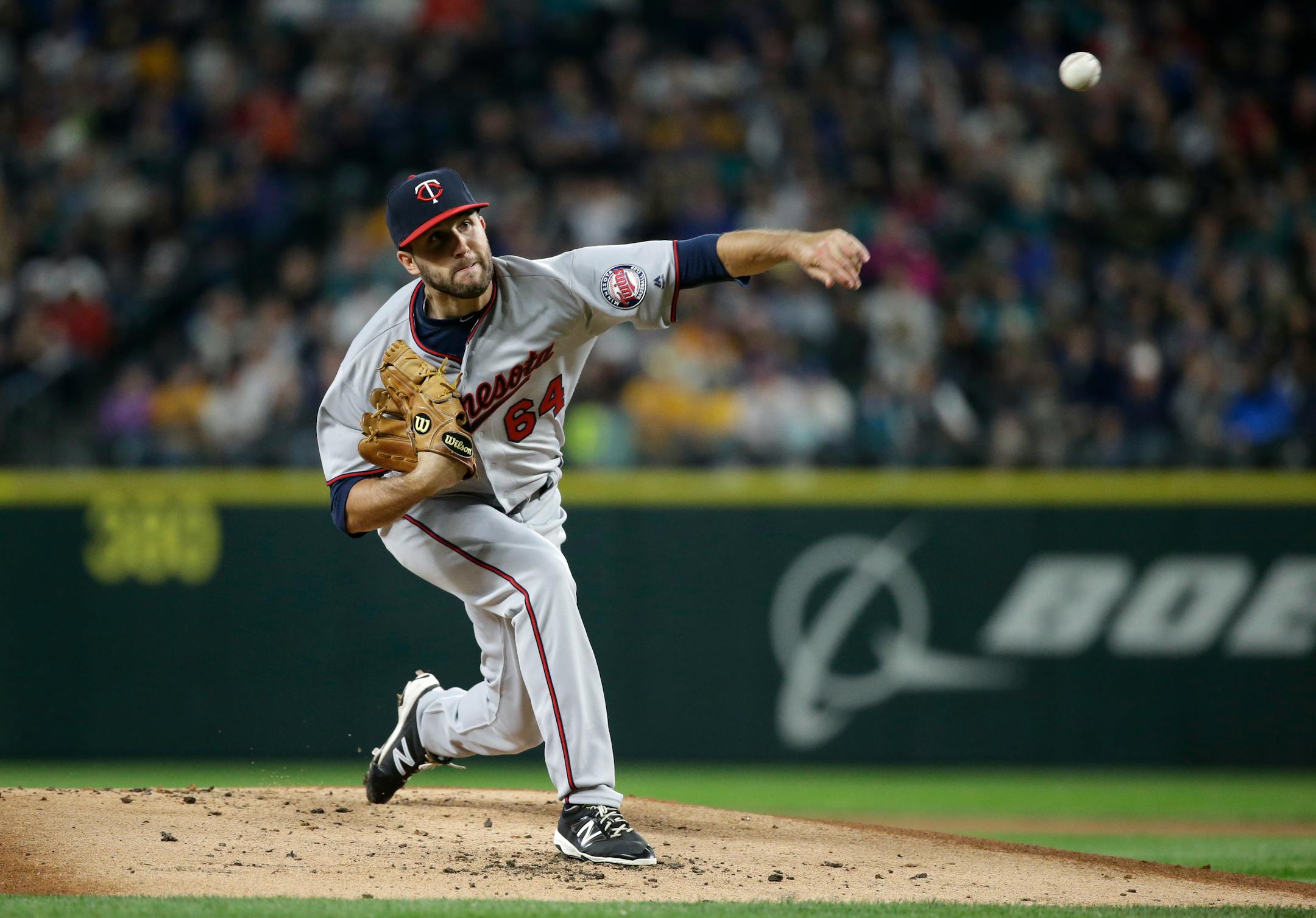 Minnesota Twins starting pitcher Pat Dean in action against the Seattle Mariners in a baseball game Friday, May 27, 2016, in Seattle. (AP Photo/Elaine Thompson)