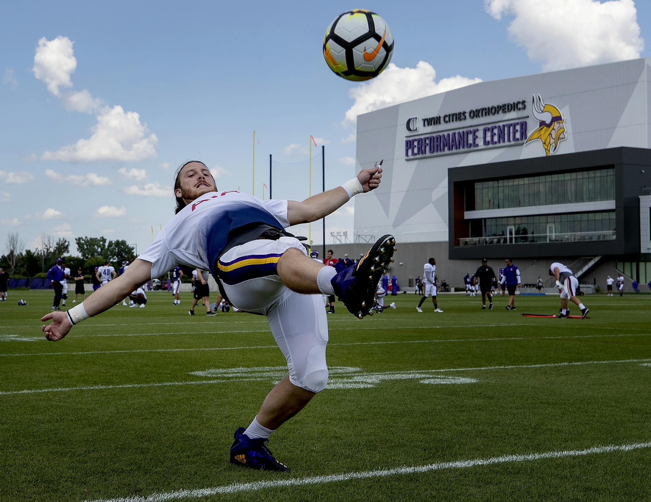 Minnesota Vikings tight end David Morgan showed his soccer skills during a meeting with players from Tottenham Hotspur players at training camp. ] CARLOS GONZALEZ ï cgonzalez@startribune.com ñ July 30, 2018, Eagan, MN, Twin Cities Orthopedics Performance Center, Minnesota Vikings Training Camp,