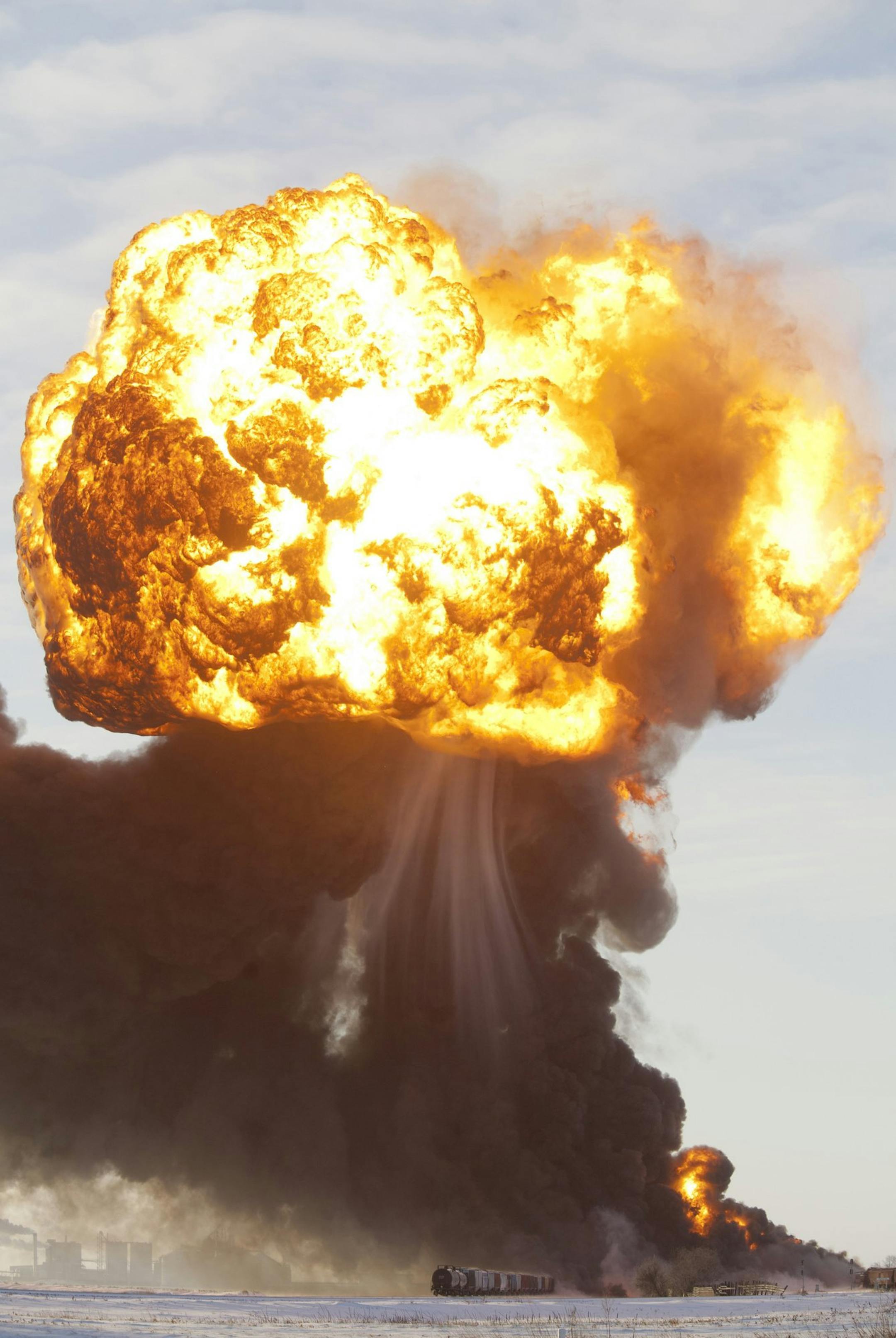 A massive fireball from an exploding train car rises into the air just west of Casselton, ND, Dec. 30, 2013. The freight train was carrying 110 cars and went off the tracks west of Casselton and was hit by a second train. There were no reports of injuries from the accident. (Dave Arntson/Zuma Press/MCT) ORG XMIT: 1147343
