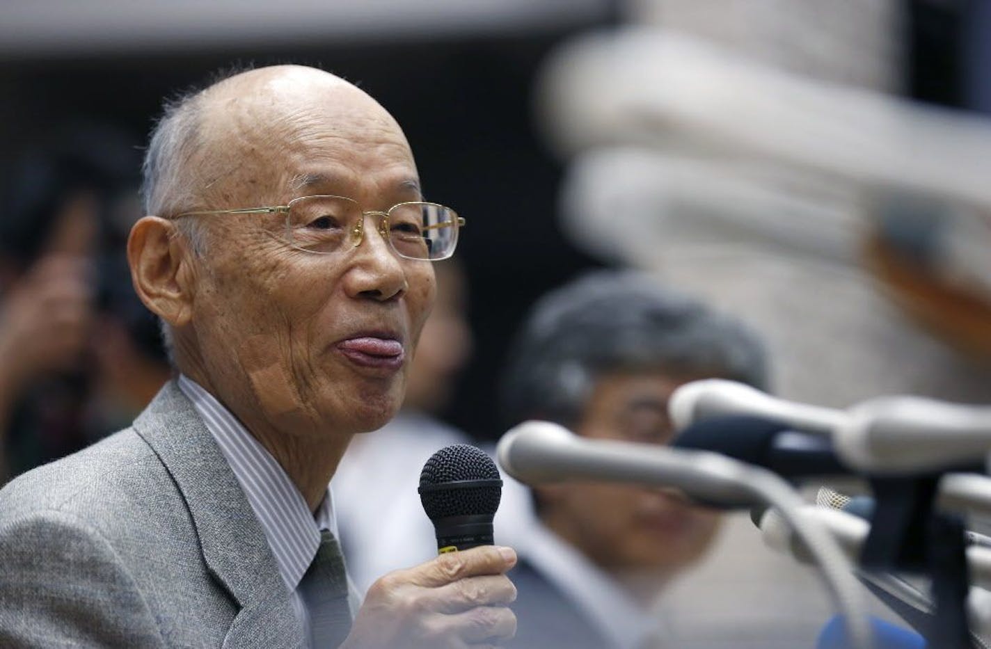 Kitasato University Prof. Emeritus Satoshi Omura speaks during a press conference at the university in Tokyo, Monday, Oct. 5, 2015 after learning he and two other scientists from Ireland and China won the Nobel Prize in medicine. The Nobel judges in Stockholm awarded the prestigious prize to Omura, Irish-born William Campbell and Tu Youyou - the first-ever Chinese medicine laureate, for discovering drugs against malaria and other parasitic diseases that affect hundreds of millions of people ever