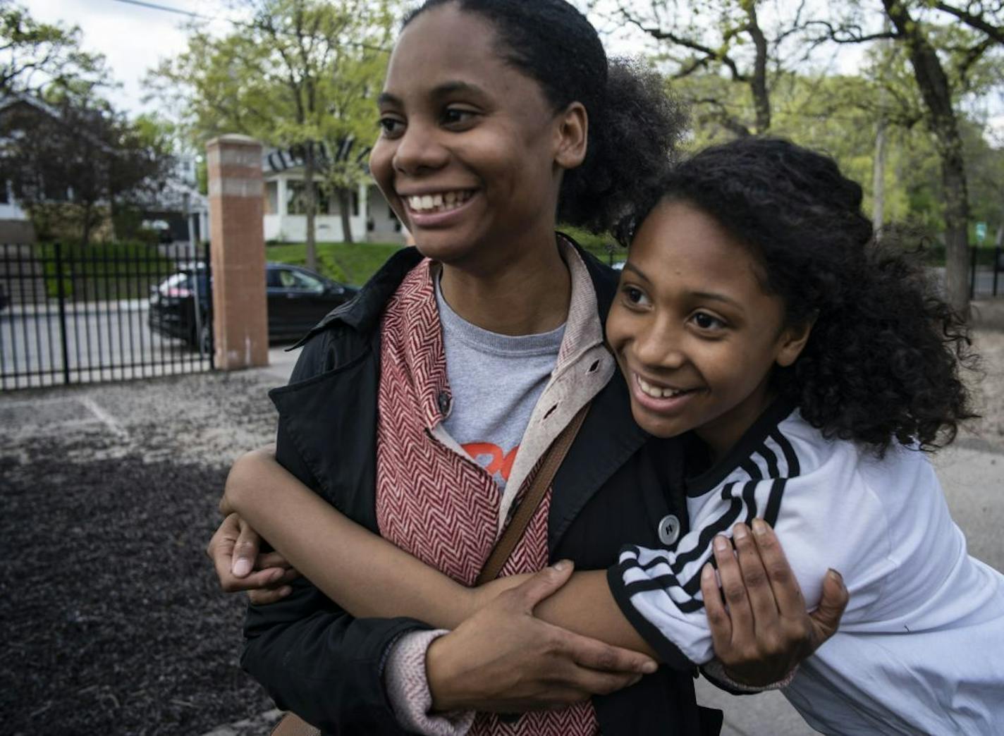 Tori Boyer, who has traumatic brain injury kept files for social services paper work but recently lost much of it in a theft. She picks up daughter Alanna who has autism at school.