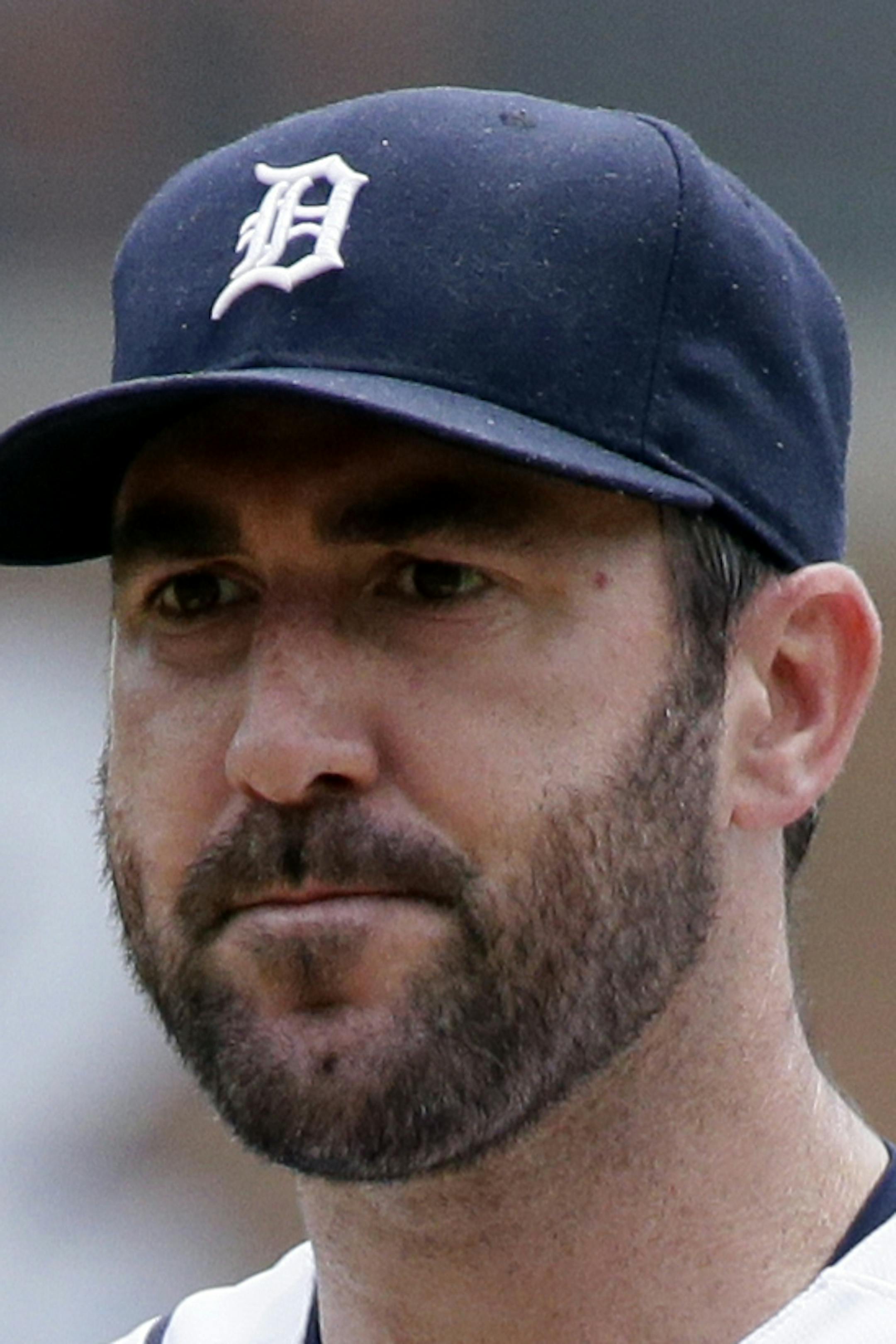 Detroit Tigers' Justin Verlander takes the signs from his catcher during the second inning of a baseball game against the Cleveland Indians Sunday, June 26, 2016, in Detroit. (AP Photo/Duane Burleson)