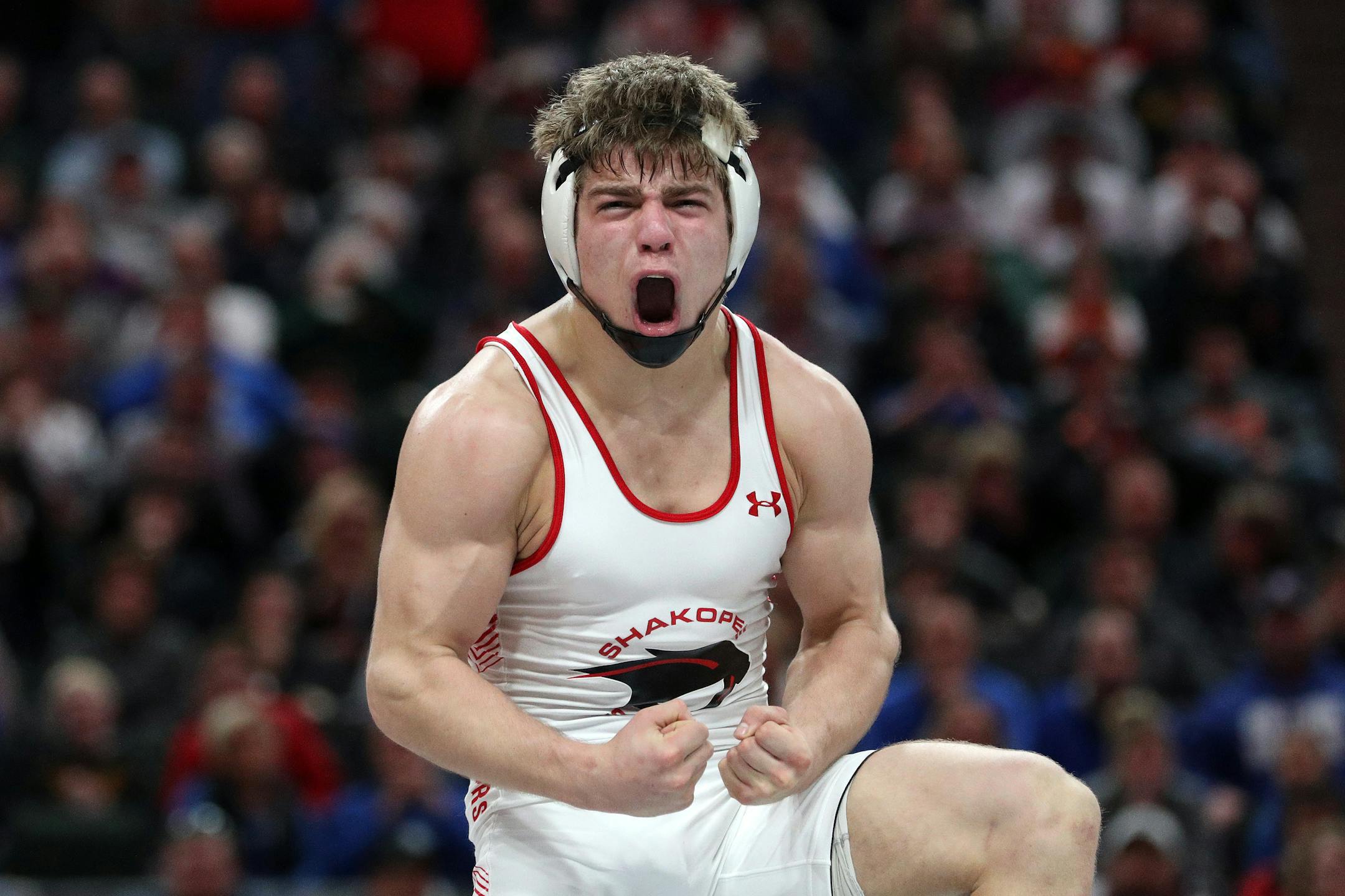 Alex Lloyd, an adopted Russian orphan, is repaying his American parents on the mat.