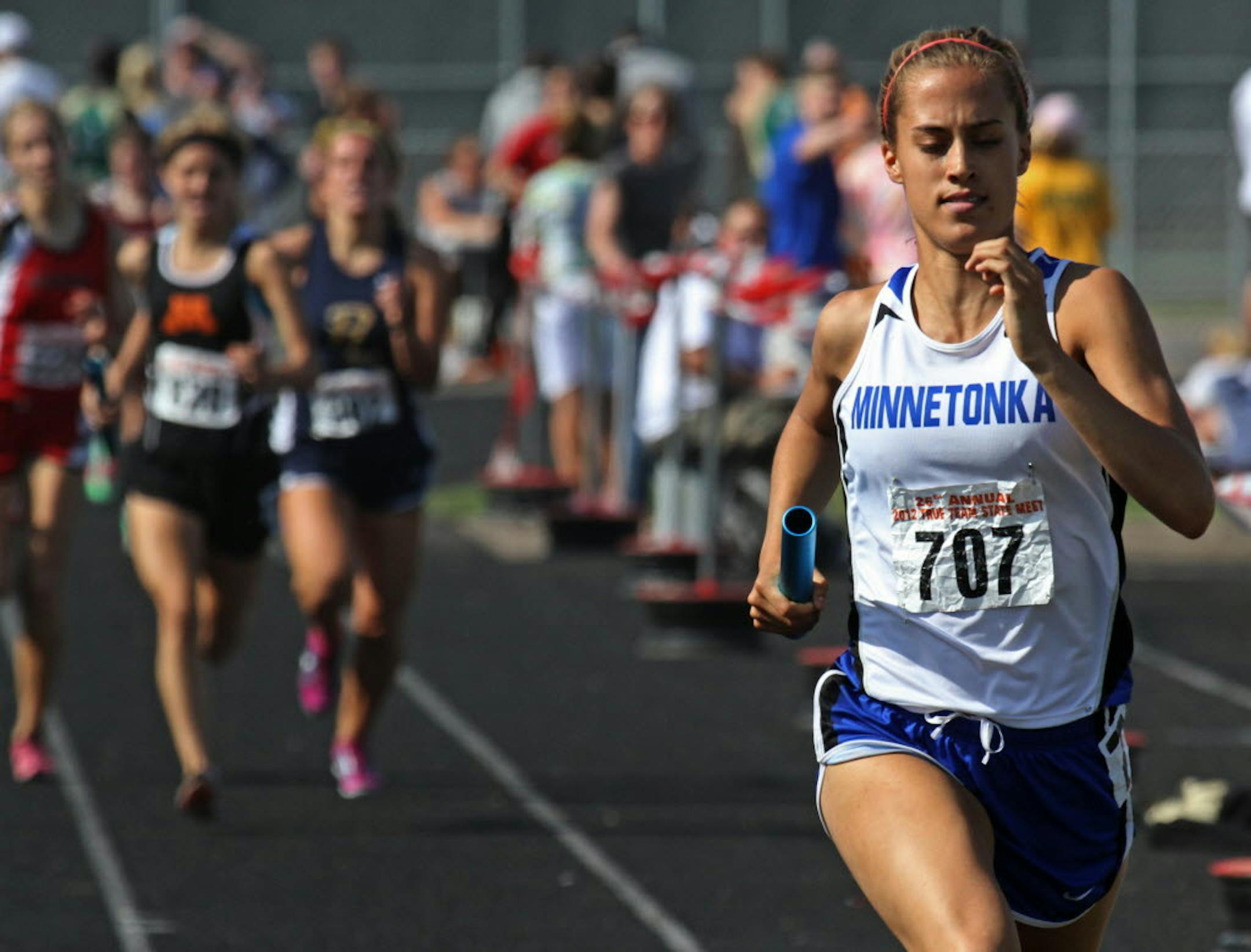 Maggie Carruth of Minnetonka pulled away in the last leg to win the Girls 4x800 meter relay at the State True Team Track Meet in Stillwater. Carruth had surgery for popliteal entrapment syndrome, a rare condition for young women. Photo: Bruce Bisping/Star Tribune bbisping@startribune.com