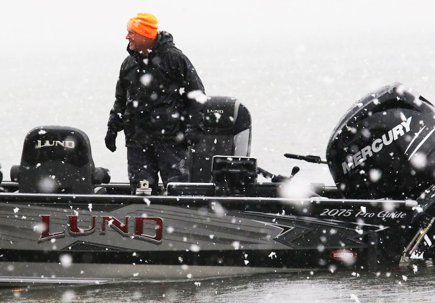 Lee Bergstrom of Ottertail waited for an opening at a boat landing after calling it quits Saturday after fishing from 6 to 10:30 a.m. on Otter Tail Lake. The walleyes were biting, but Bergstrom said the snow, rain and wind made it too much of a struggle to fish.