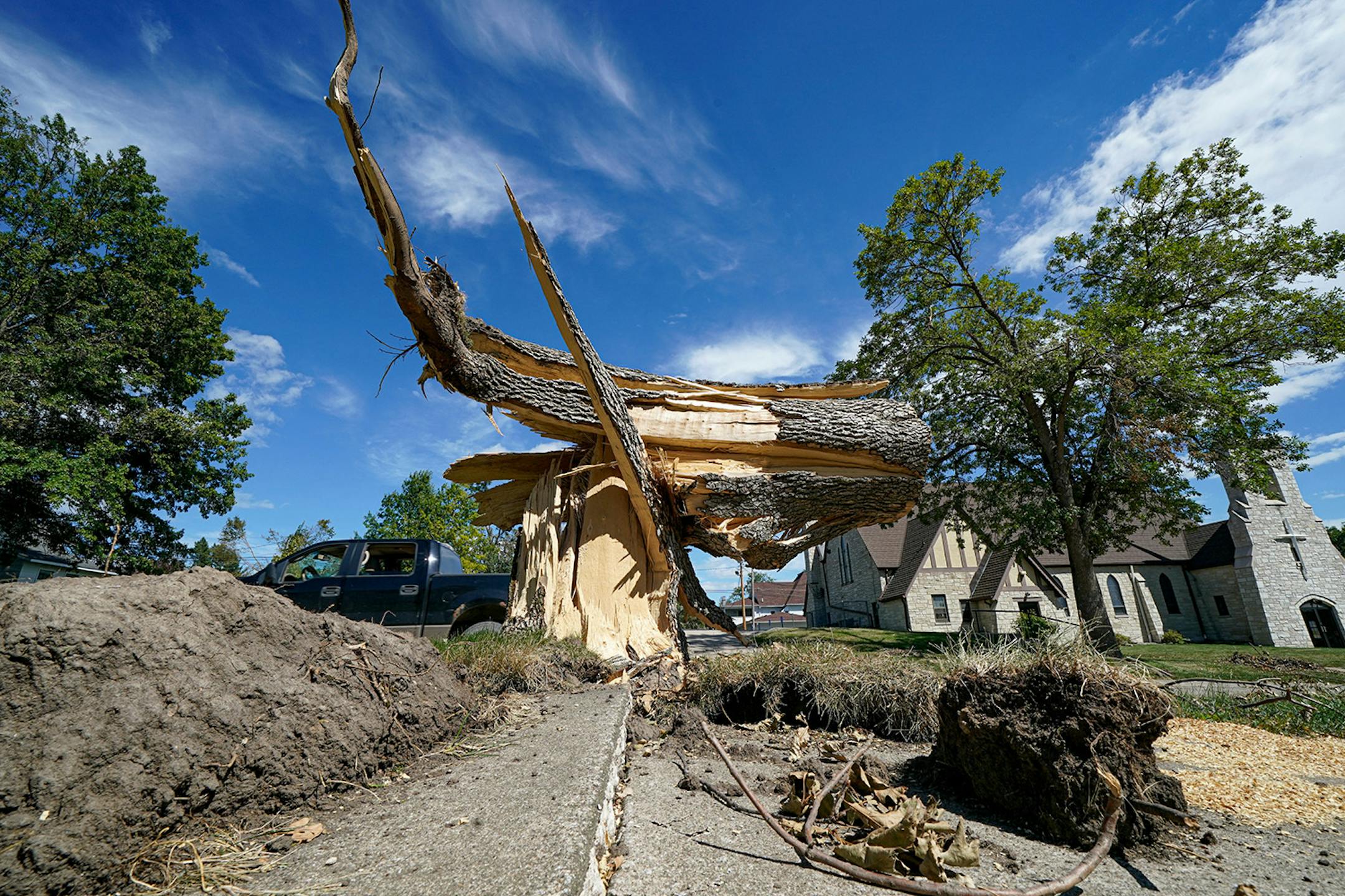 Winds up to 100 miles per hour ripped up trees and crops last week through much of central Iowa.