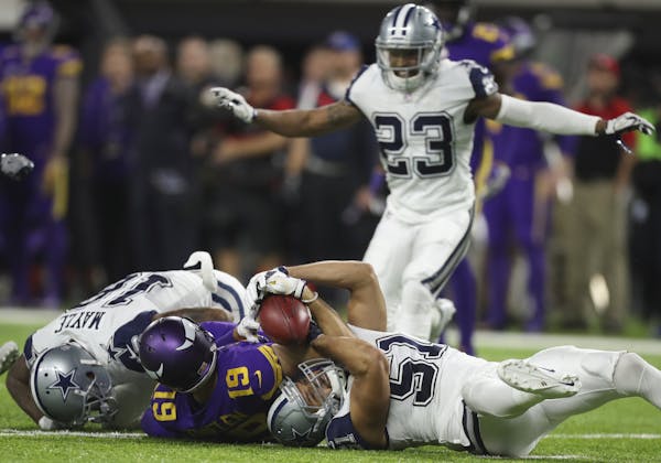Dallas Cowboys outside linebacker Kyle Wilber (51) ended up with the ball after Vikings wide receiver Adam Thielen (19) lost control of it while field