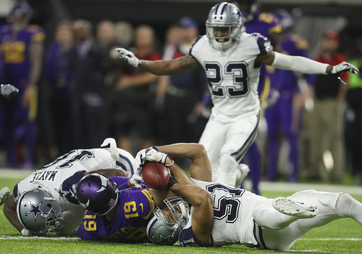 Dallas Cowboys outside linebacker Kyle Wilber (51) ended up with the ball after Vikings wide receiver Adam Thielen (19) lost control of it while fielding a punt in the fourth quarter. Dallas challenged the ruling on the field and scored on the next play. ] JEFF WHEELER &#xef; jeff.wheeler@startribune.com The Minnesota Vikings lost to the Dallas Cowboys 17-15 in an NFL football game Thursday night, December 1, 2016 at U.S. Bank Stadium in Minneapolis.